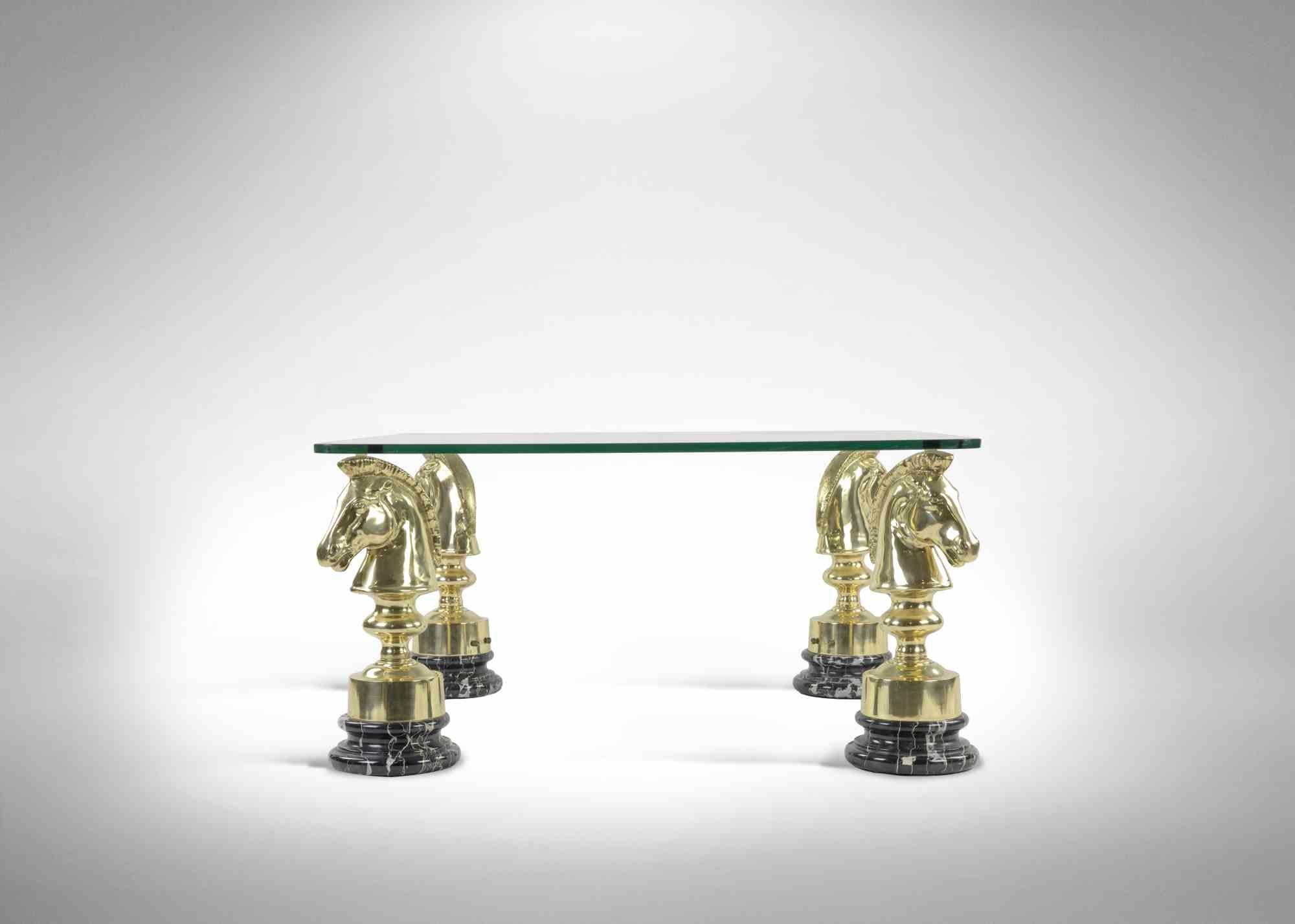Coffee table with chess horse and marble bases.

Brass, Metal, marble.

Made in Italy, around 1980.

40 x 110 x 60 cm. 

Excellent conditions!