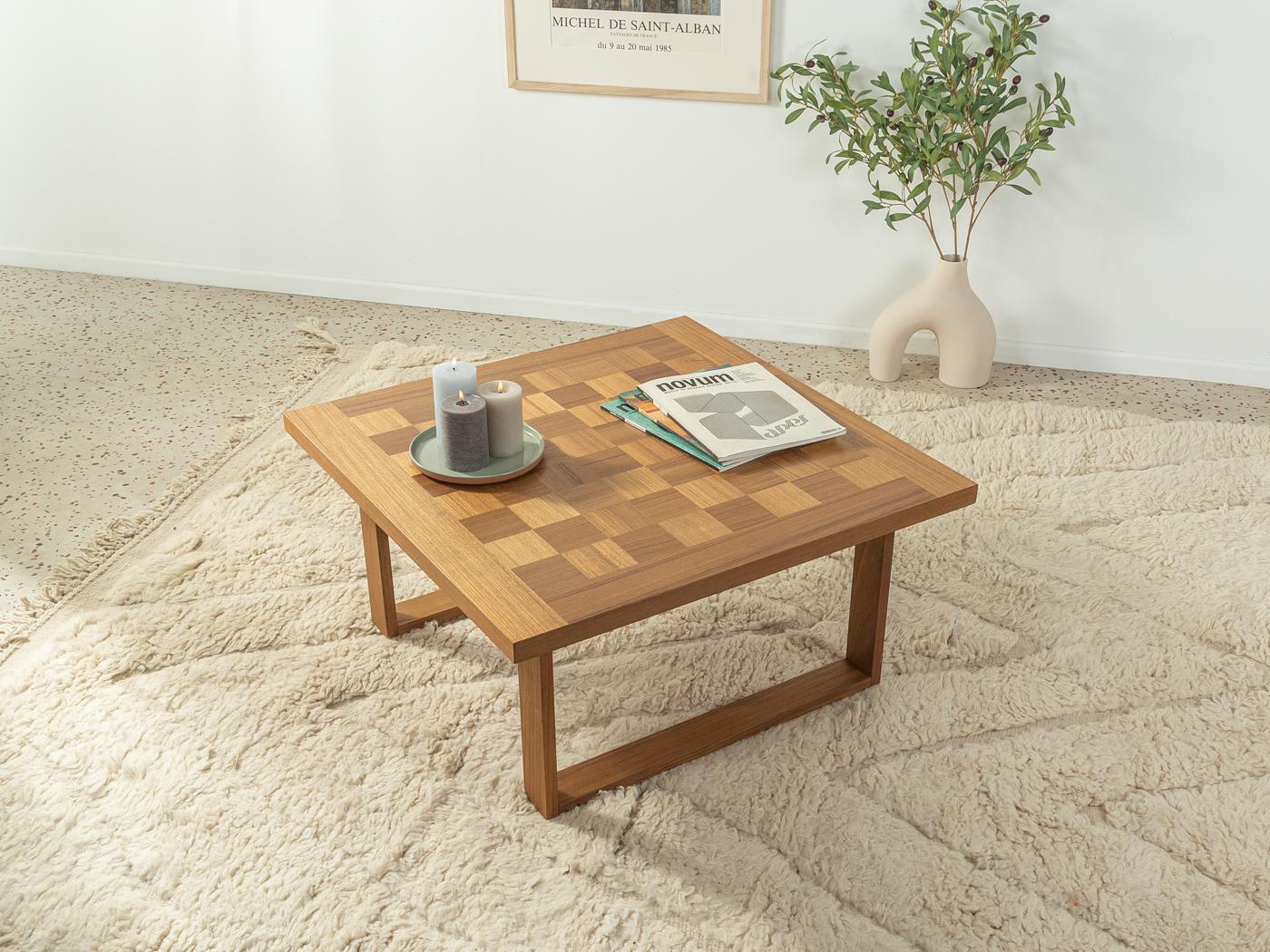 Unique coffee table by Poul Cadovius for France & Søn from the 1960s with a solid frame and top in teak.

The coffee table was stored originally packed in the basement for over 60 years and will be delivered in the original packaging.

Quality