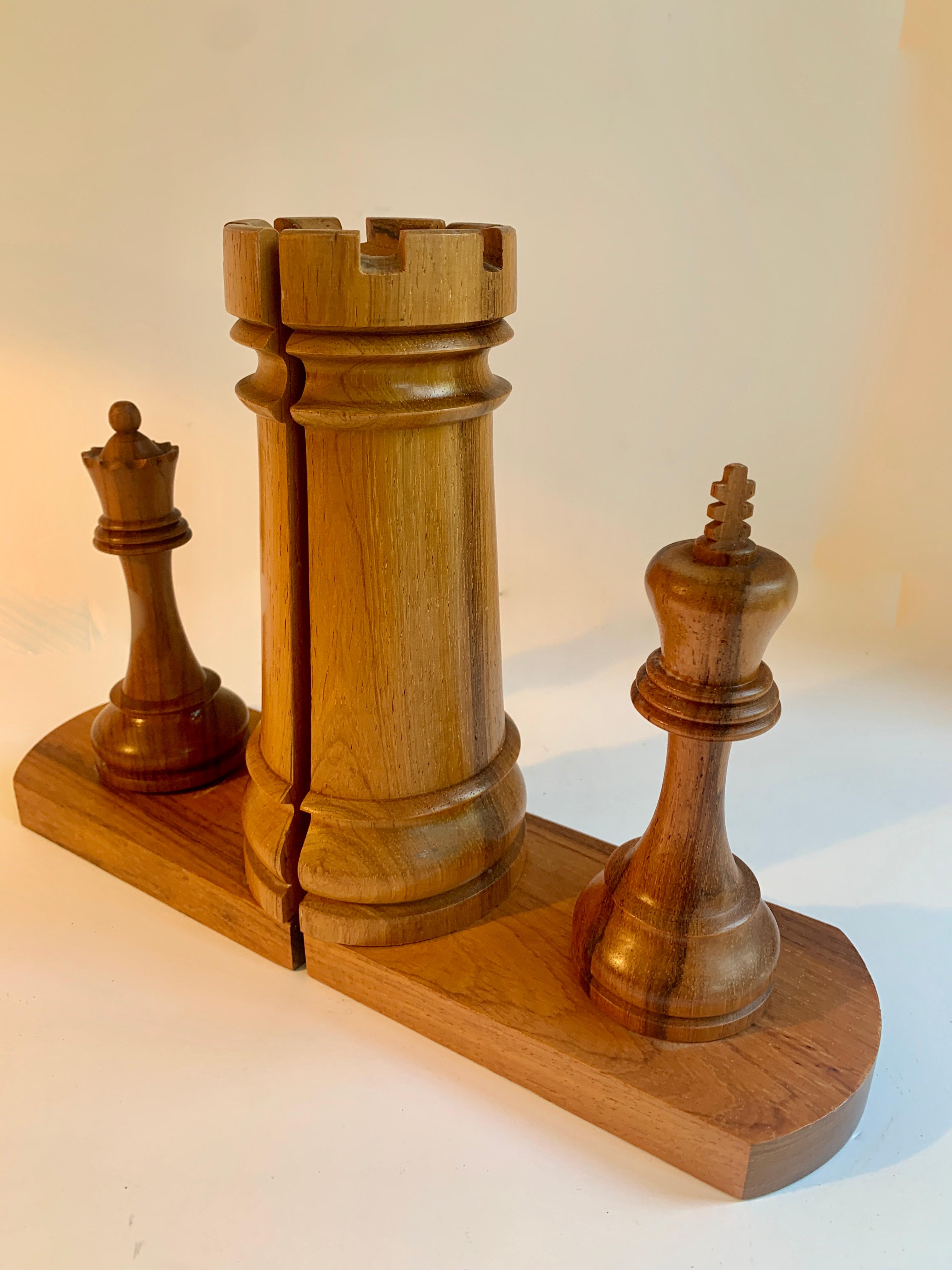 A pair of chess bookends featuring an oversized wooden rook with a 7.5