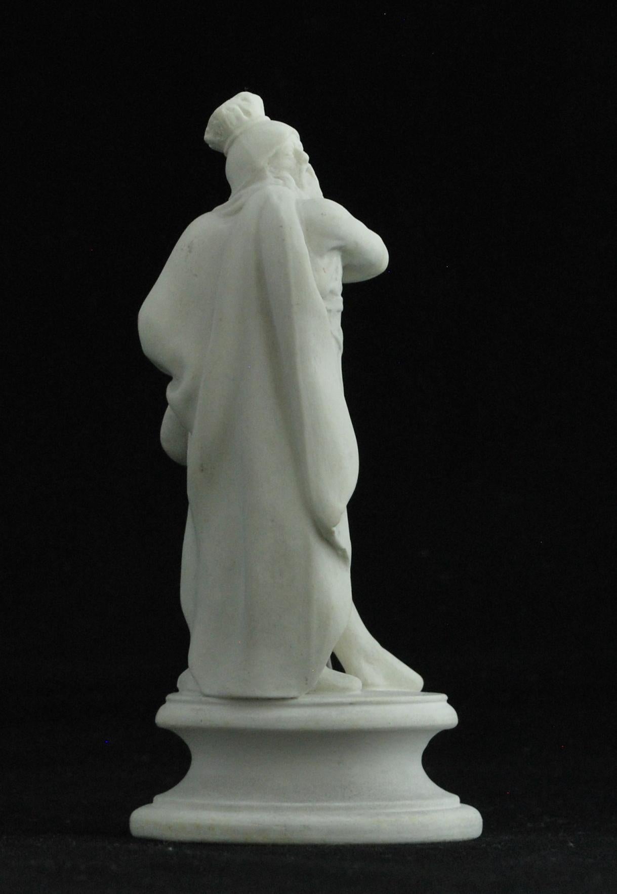 A white jasper King from the Flaxman chess set.

Unmarked, which is not unusual for chess pieces of this period.
  