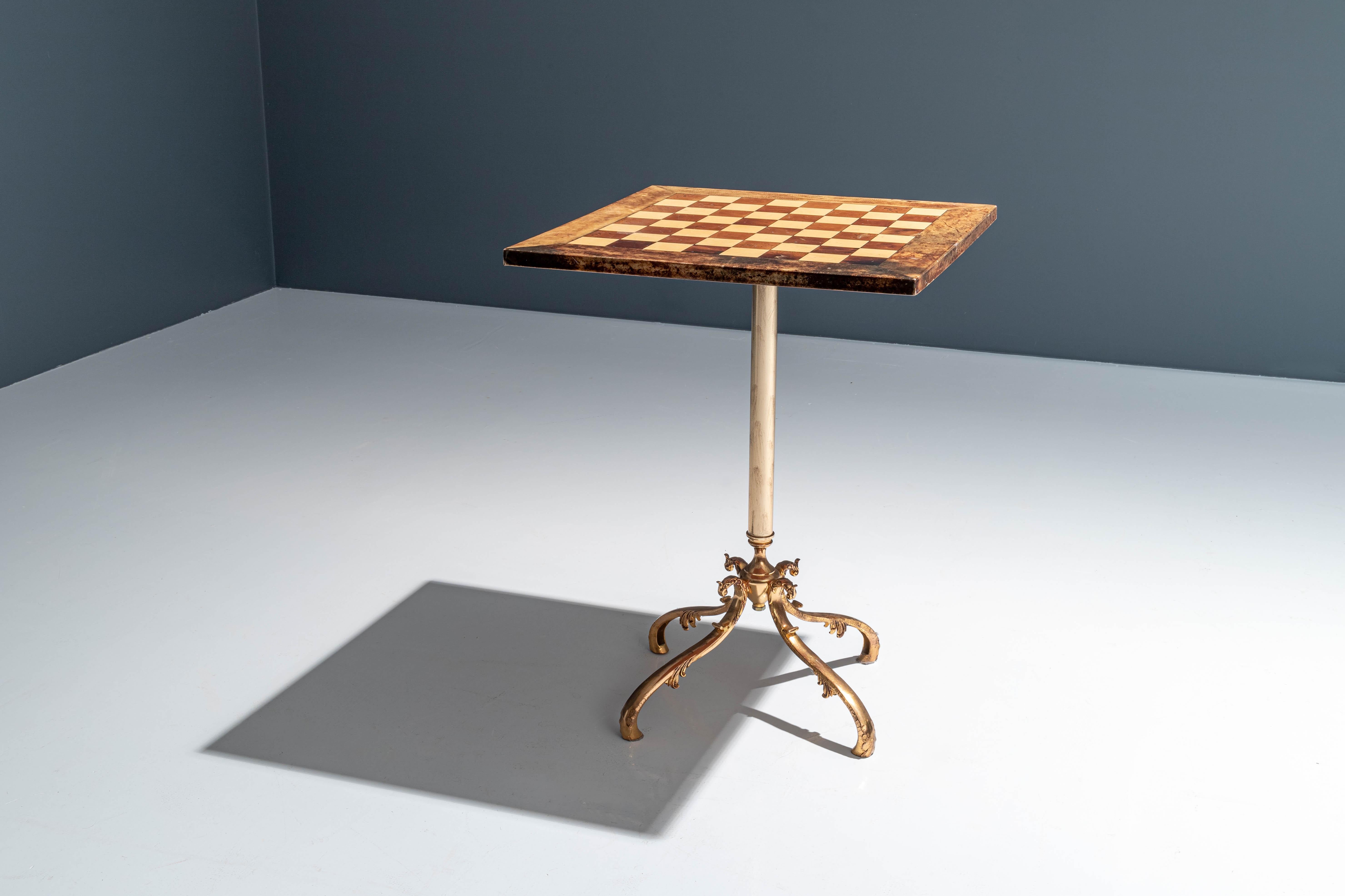 Chessboard by Aldo Tura in lacquered goatskin and bronzed legs.

Stylish piece of art in good condition. For anyone who is looking for something exceptional, in this case the game of games: A chessboard by Aldo Tura. Not sure if he played the game