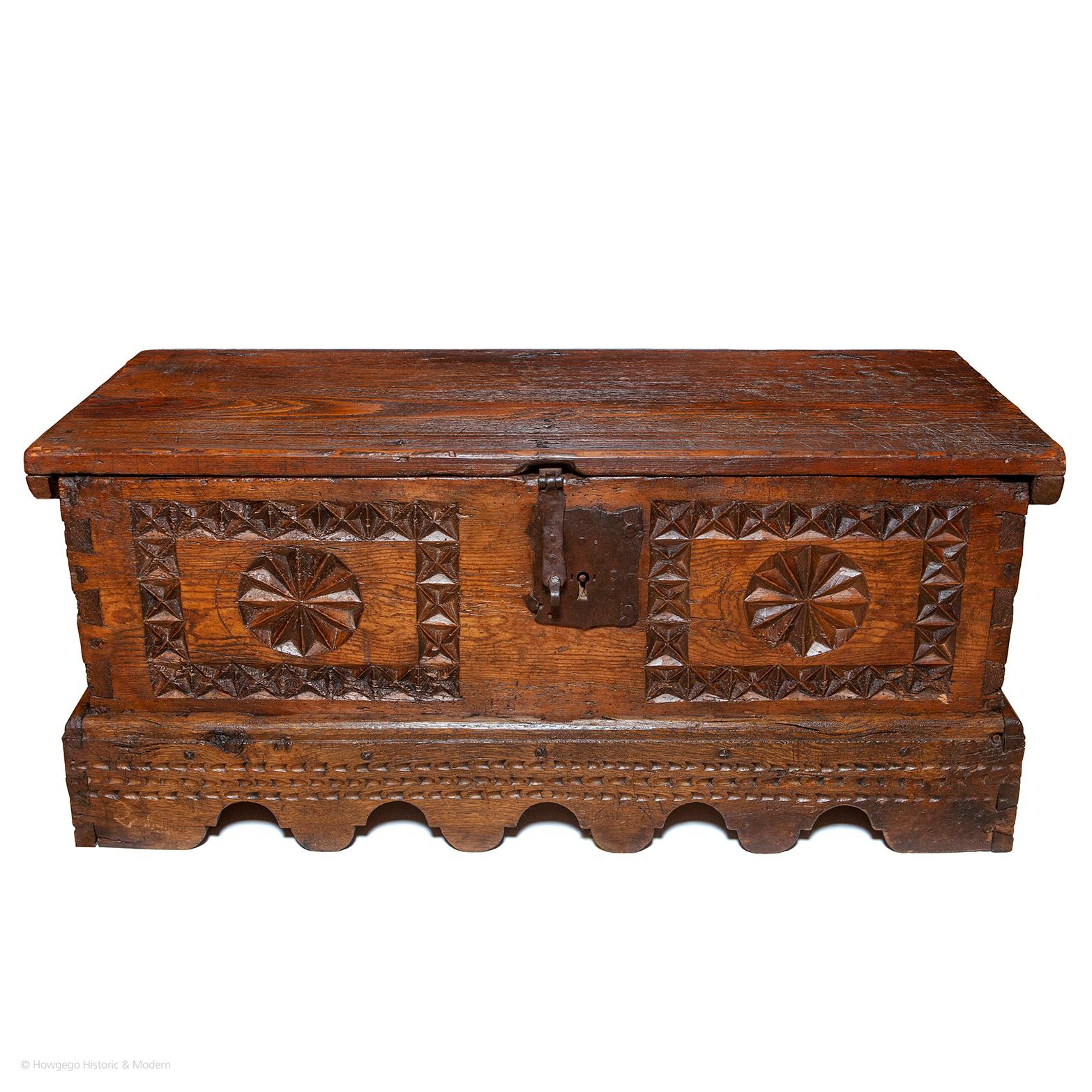 - Rare small size, would work as a sofa or low table with the advantage of storage space
- Characterful chip carving, ironwork and figuring injecting atmosphere into any interior
- Warm, rich, lustrous color and patina.

Single plank top with