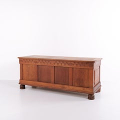 Chest in Oak with Carved Details and round Legs from 1920's
