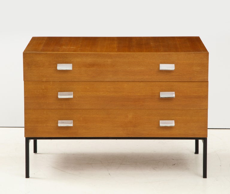 Rare and Exceptional Chest of Drawers (Model 812) by acclaimed French designer Andre Monpoix for Muebles T.V., circa 1955.

This highly collectible chest consists of a solid oak construction, black lacquered metal legs, and sleek chrome pulls. The