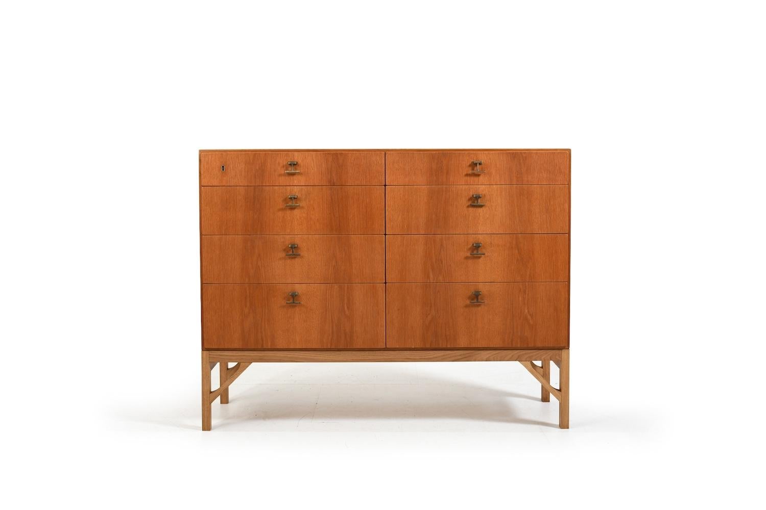 Fine chest of drawer, model no.234 in oak  by Børge Mogensen for FDB Møbler, Denmark. Eight drawers with fittings / handles made of brass. Incl. key.  Børge Mogensen designed his China Series in 1960s. Produced 1960s.