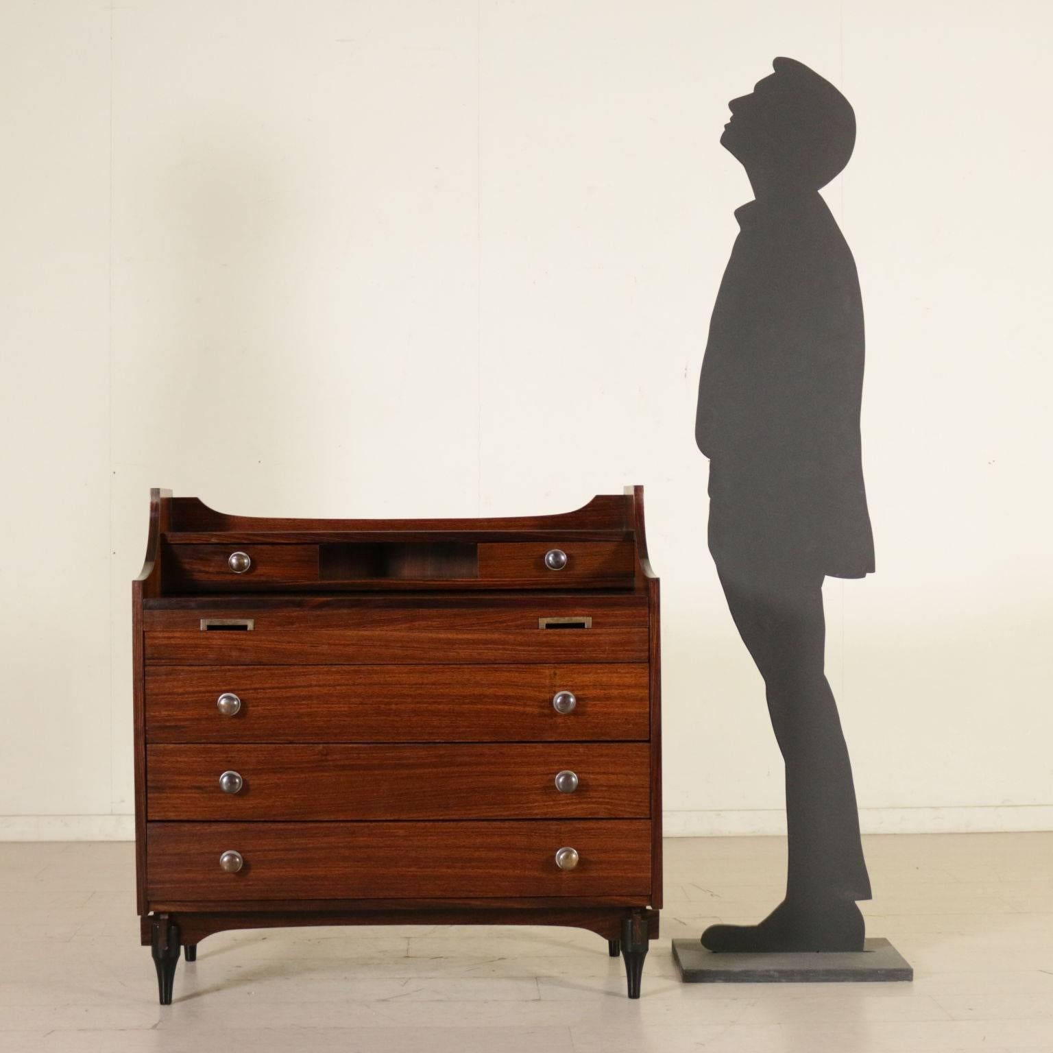 A chest of drawers convertible in a dressing table with extractable top and a drop-leaf. Designed by Claudio Salocchi for Sormani, model: SC 284. Rosewood veneer, manufactured in Italy, 1960s.