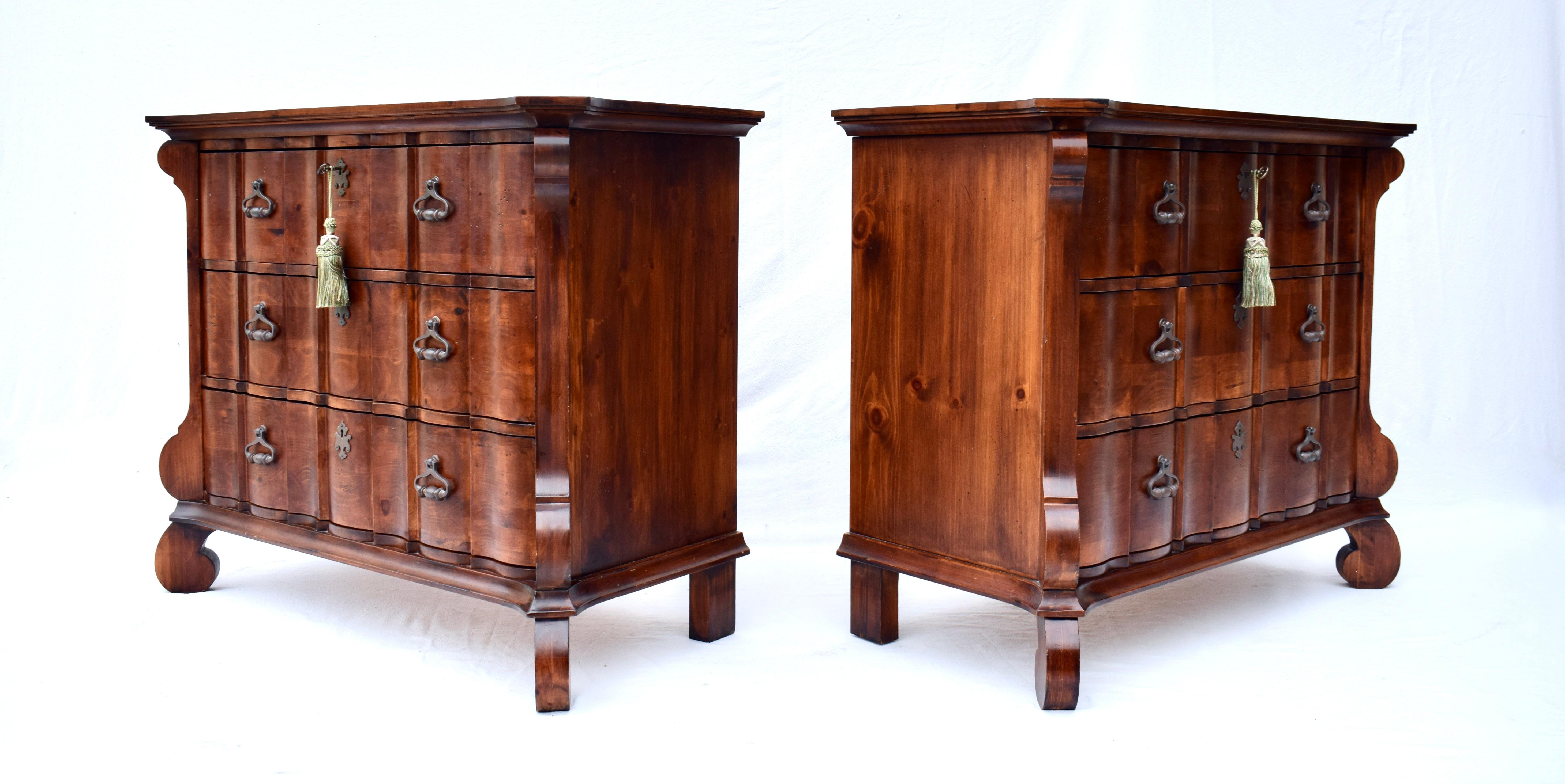 An exceptional pair of Spanish Baroque style commodes, dressers or chests of drawers of solid pine construction, original Iron hardware with working locks & keys. Featuring three dovetail drawers with generous proportions, the chests are of
