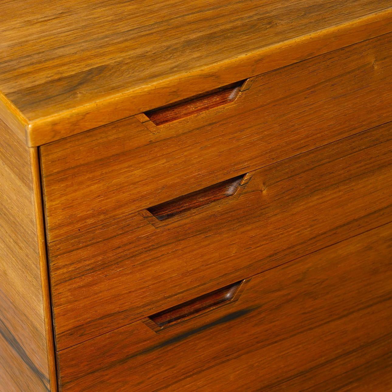 Elegant commode designed by Svend Langkilde and produced by his company. Langkilde Møbler was founded in 1953 and enjoyed great success. The high-quality finish and refined details of this commode, like the beautiful grain and interior drawers, give