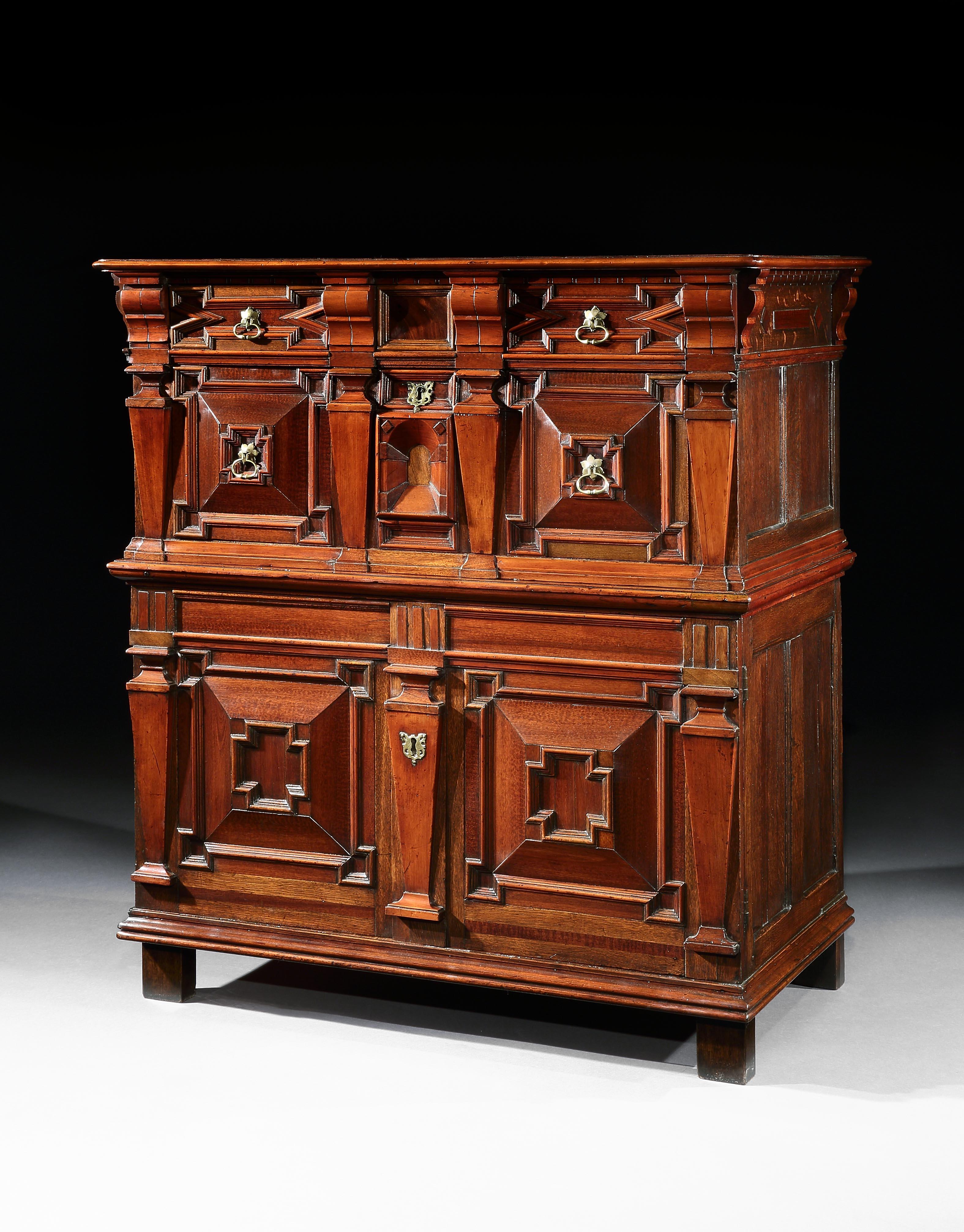 A museum quality, English, Late-Renaissance, cedar enclosed chest of drawers with exceptional snakewood, walnut & oak with an architectural or façade front

This is the most sophisticated English model of chest of drawers conceived as a cabinet