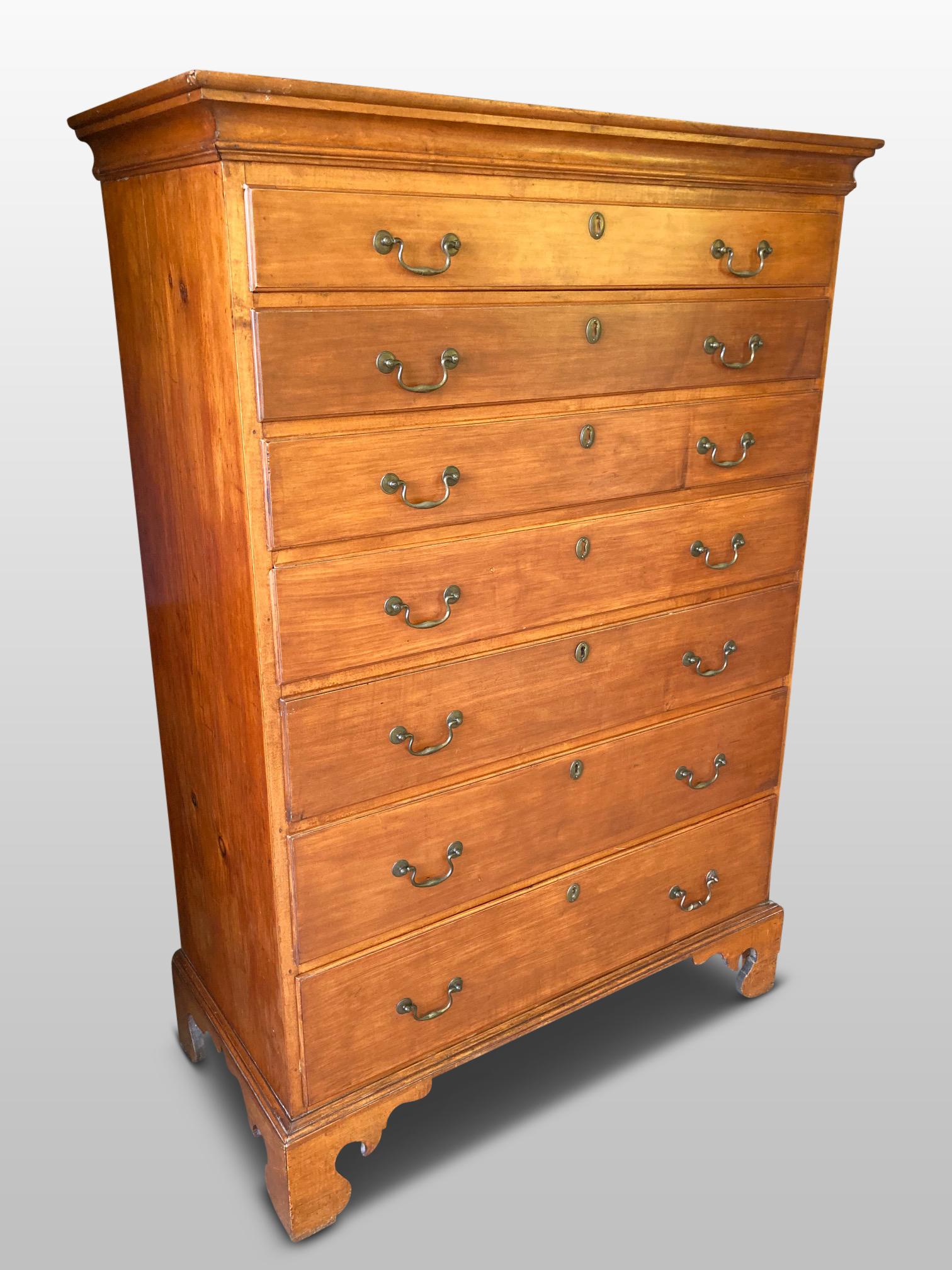 Good quality 1920s chest of 7 drawers in the Georgian style.
This delightful chest is a very exacting copy of a Georgian Antique. The fronts of the drawers are in cherrywood with superb antique brass swan neck handles. The ends of the chest are in