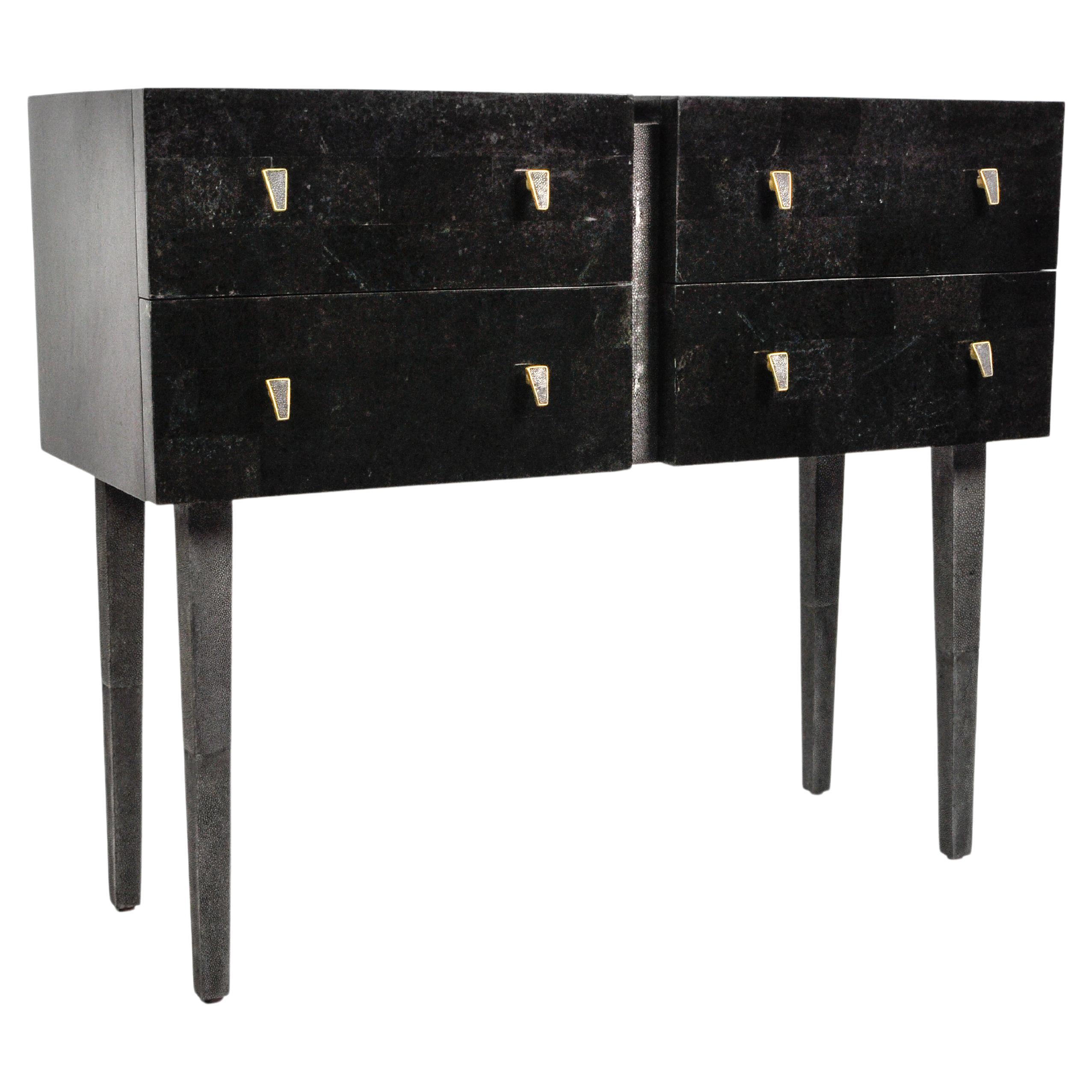 Chest of drawers in Black stone marquetry by Ginger Brown