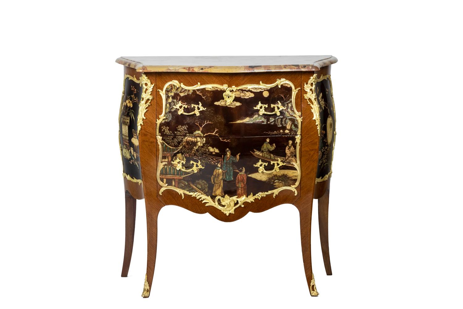 Chest of drawers in the Louis XV style, in veneer, lacquer and bronze. The Japanese-style lacquer decorations, in cartridges decorated with gilded and chiseled bronzes and in a fretted shape, the cartridge on the front ending in the lower part with