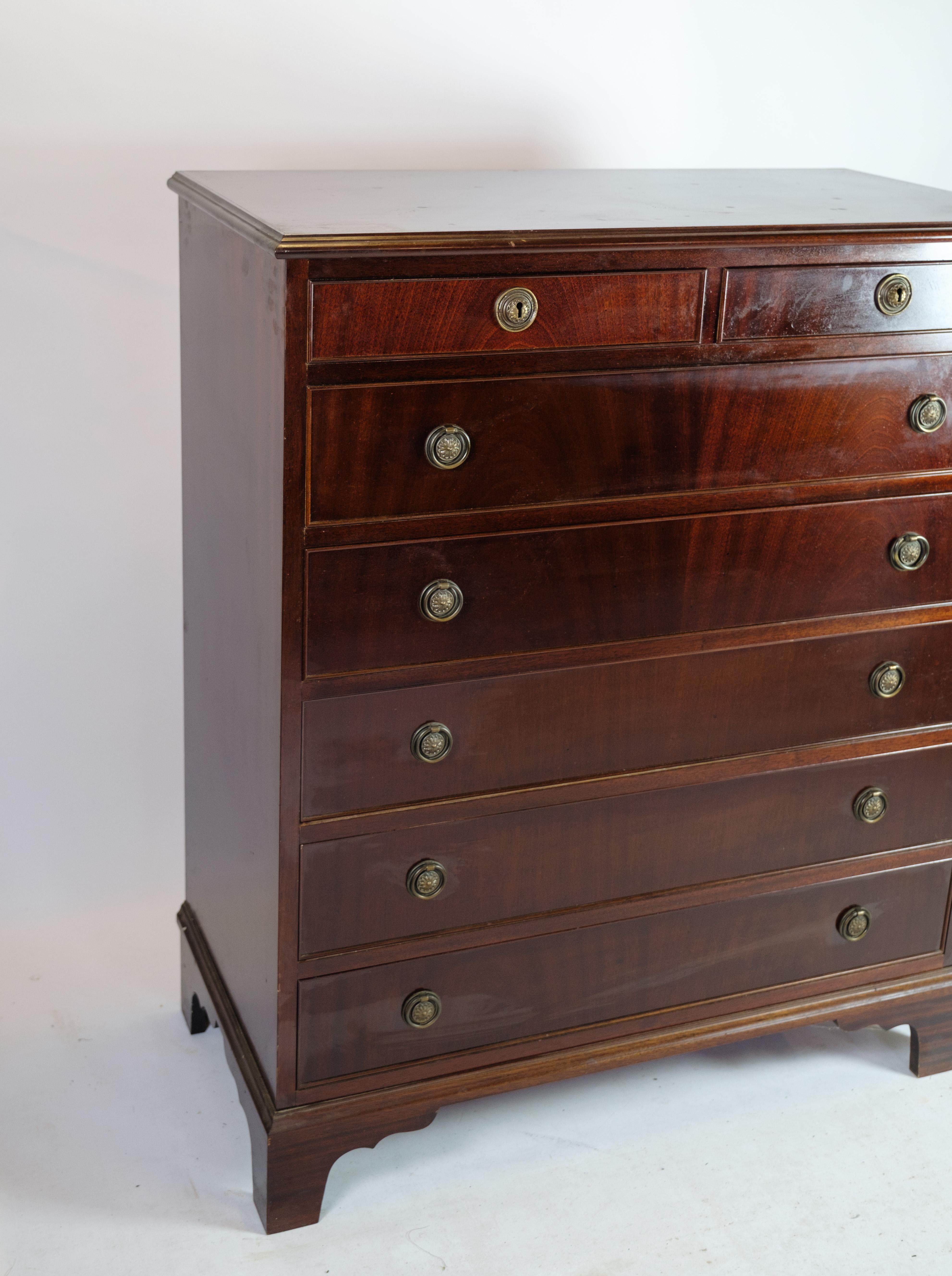 A 7 drawer polished mahogany chest of drawers from around the 1930s is a fantastic example of classic and elegant furniture design from the late 1800s adorned with beautiful brass handles.

Mahogany wood is an exclusive wood with a rich and deep