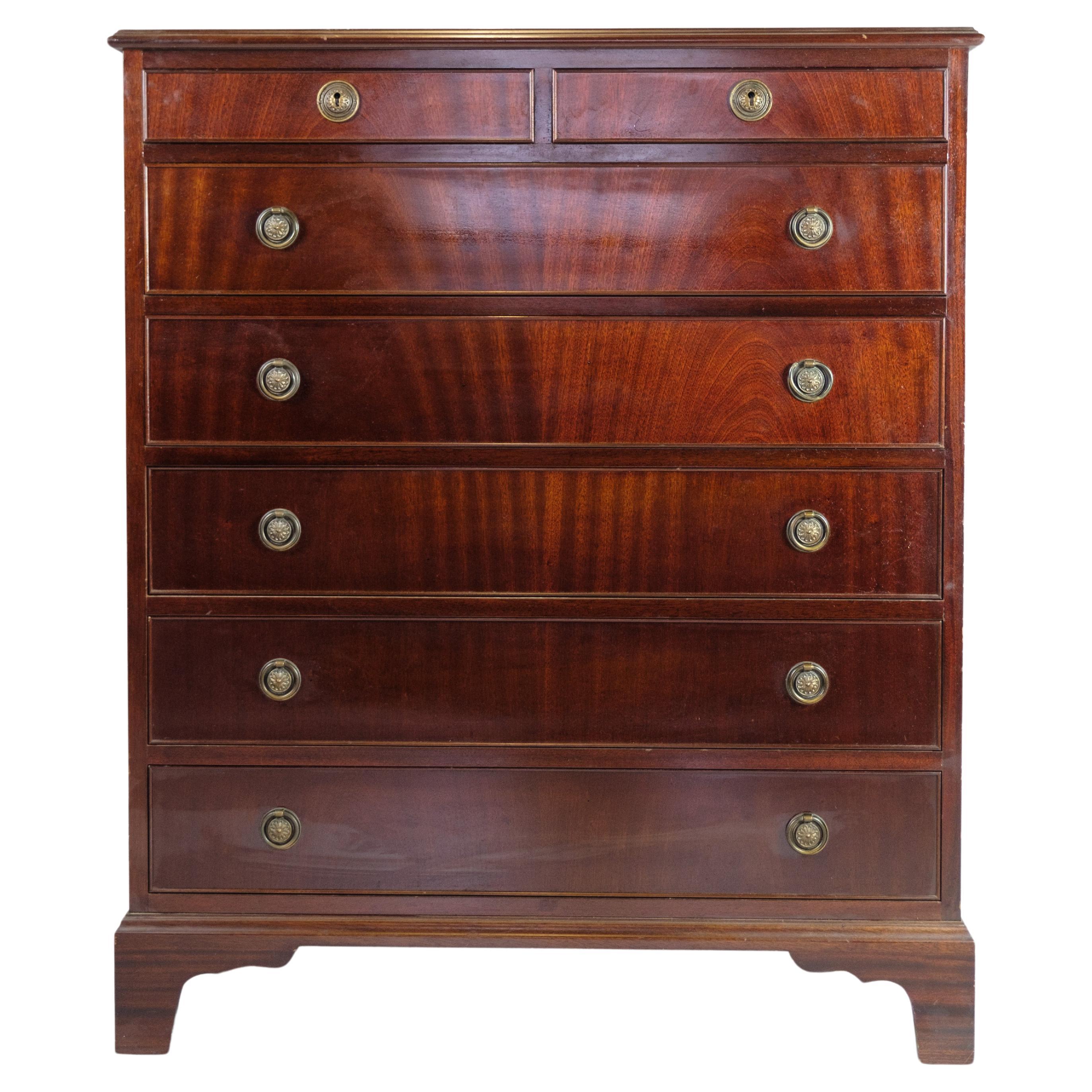 Chest of drawers In Mahogany With 7 drawers and Brass handles From The 1930