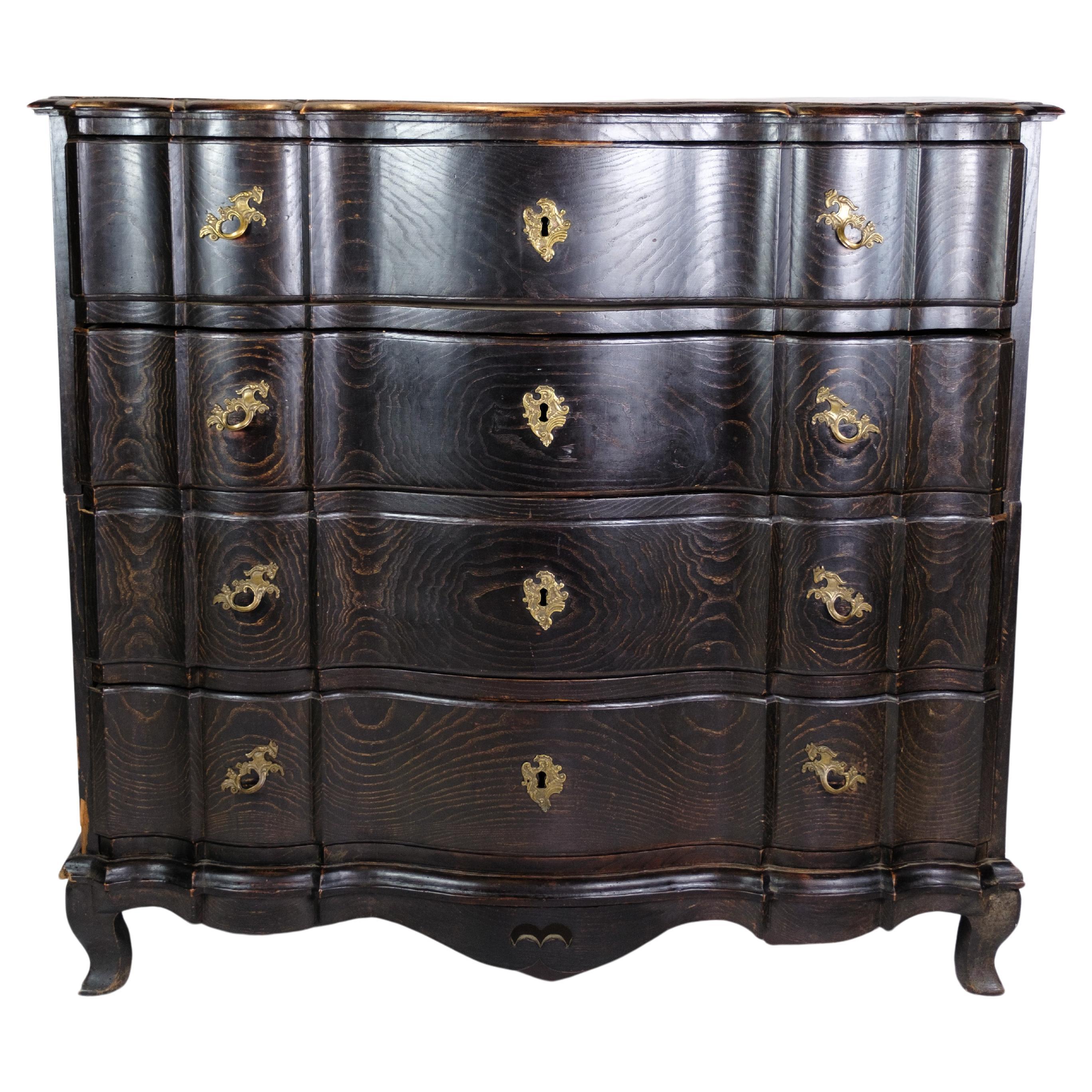 Chest of drawers in Stained oak with Brass from the 19th century For Sale
