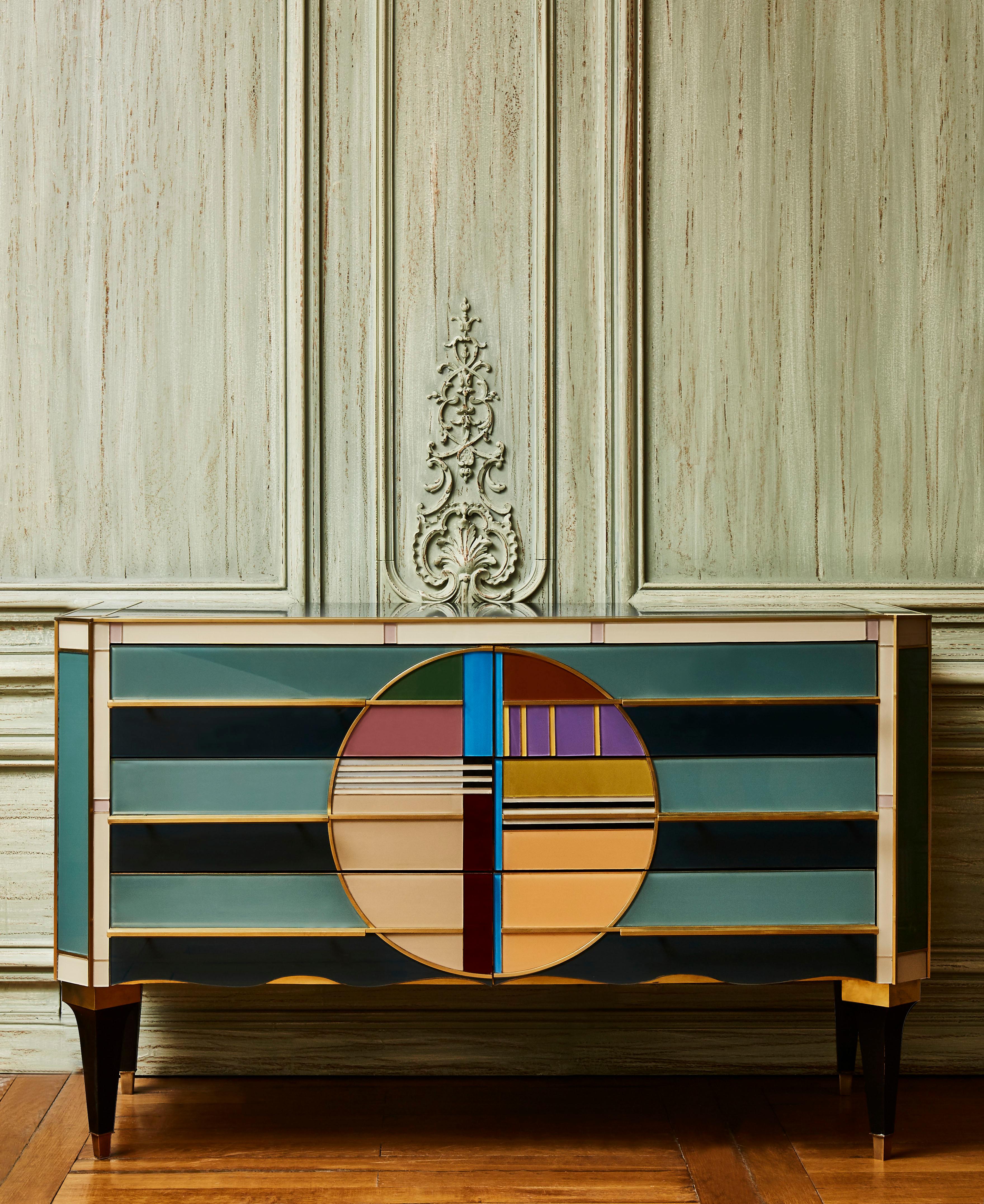Vintage chest of drawers in wood. Entirely restored and customized with brass inlays, and tainted mirrors.
6 drawers. Italy, 1970s. Creation by Studio Glustin.

 