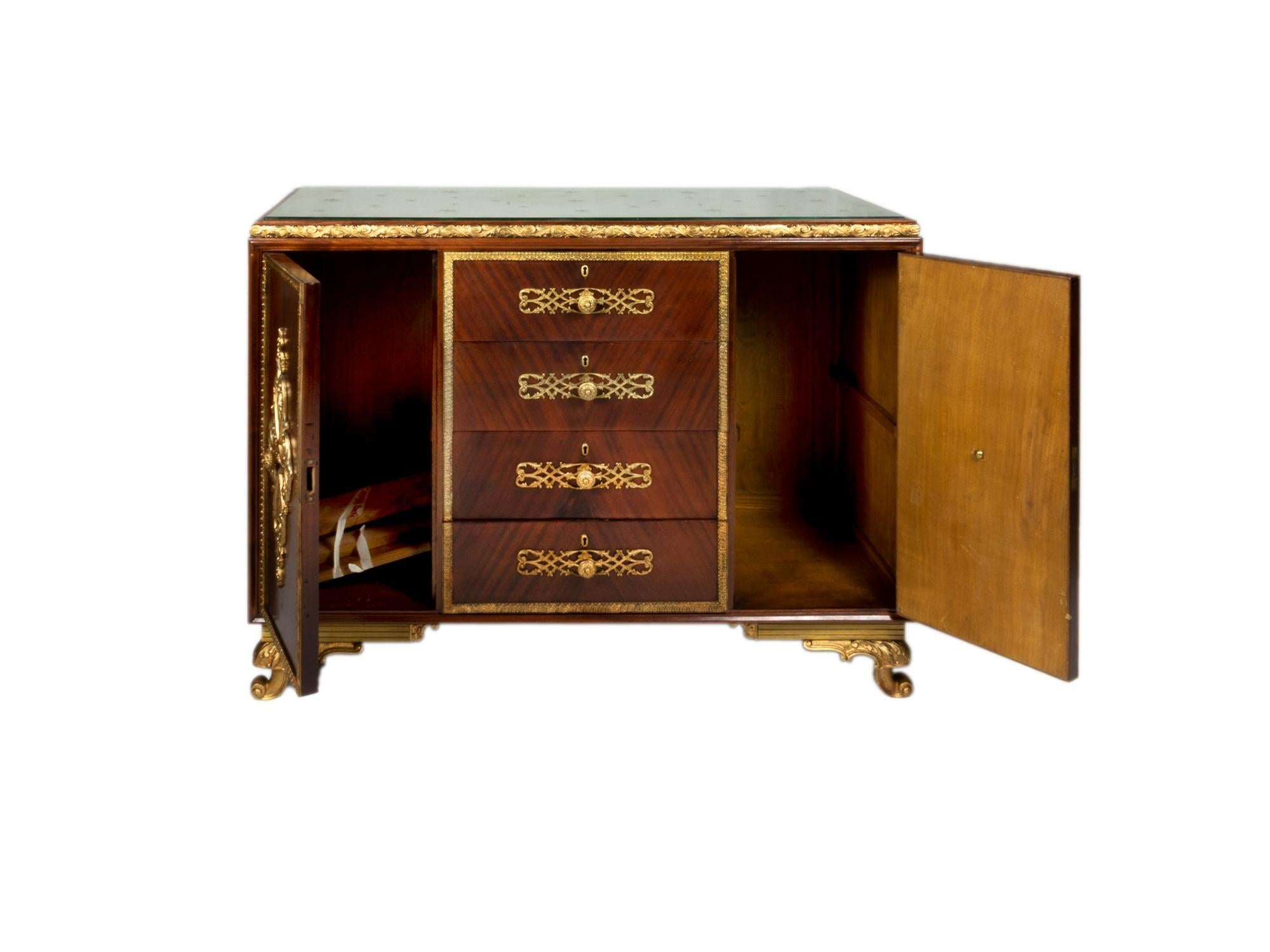 Chest of drawers with mirrored top with encrusted stars, gilded bronze and parquetry with a modern take and fusion style of Louis XV.