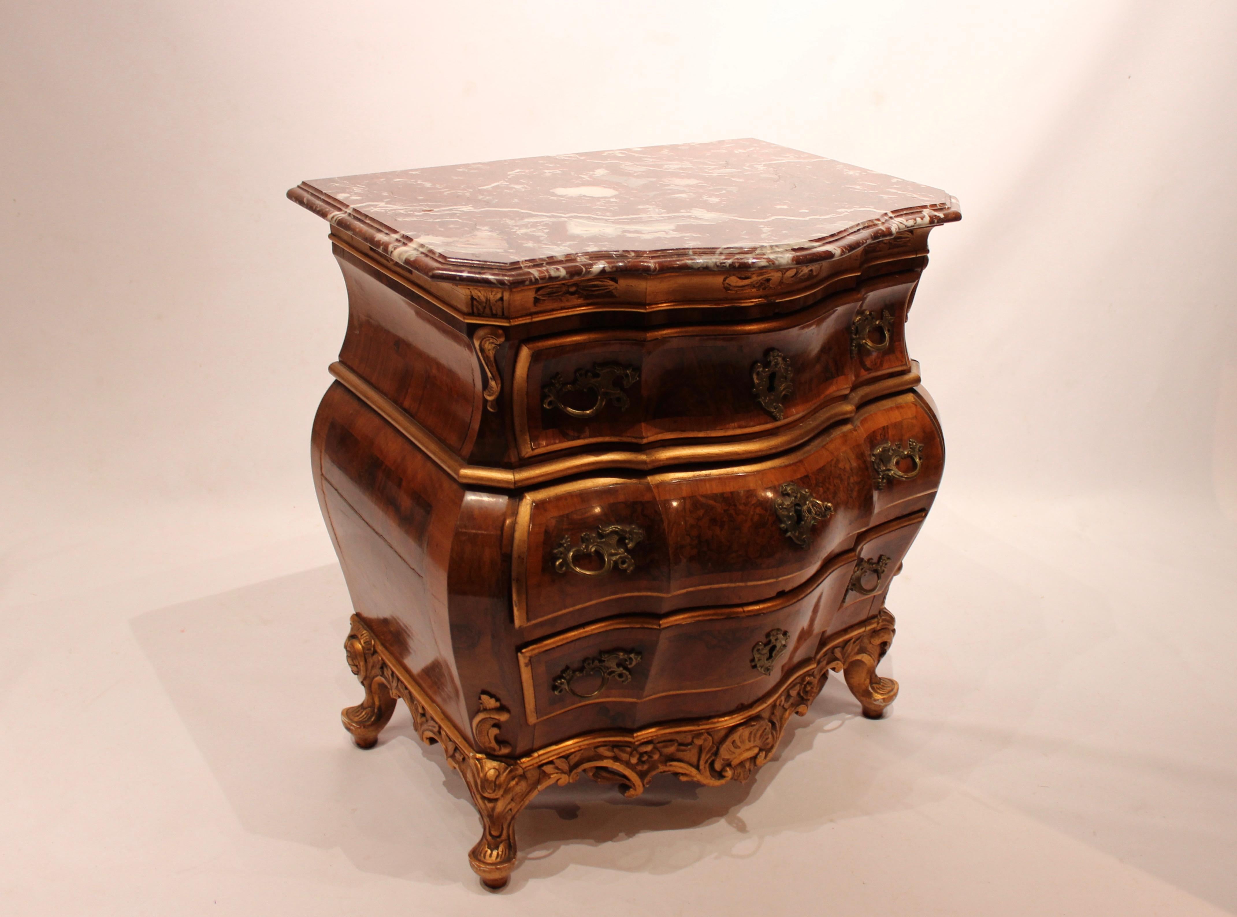 Chest of drawers of walnut with marble top plate from Denmark, circa 1880s. The chest is in great antique condition.