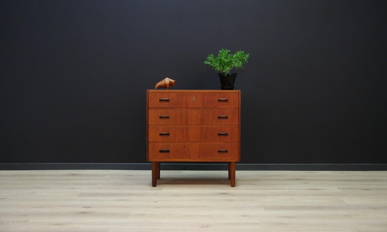 Phenomenal commode from the 1960s-1970s, Minimalist form - Scandinavian design. Surface covered with teak veneer. The furniture has four capacious drawers. No key in the set. Preserved in good condition (small bruises and scratches) - directly for