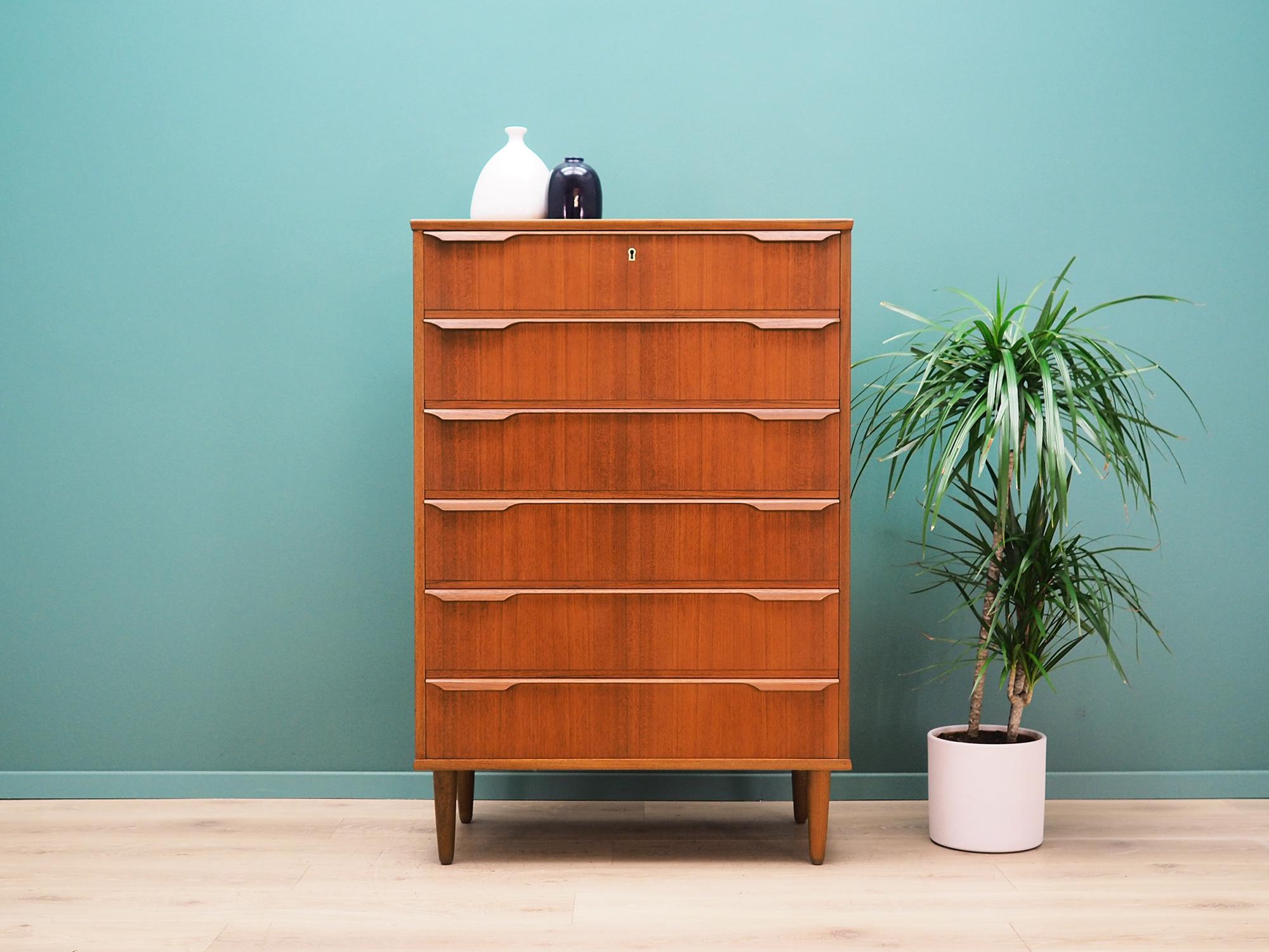 Chest of drawers was made in the 1960s by the well-known Danish factory Trekanten-Hestbæk A/S.

The construction is covered with teak veneer. The legs and handles are made of solid teak. Surface after refreshing. The chest of drawers is a Classic