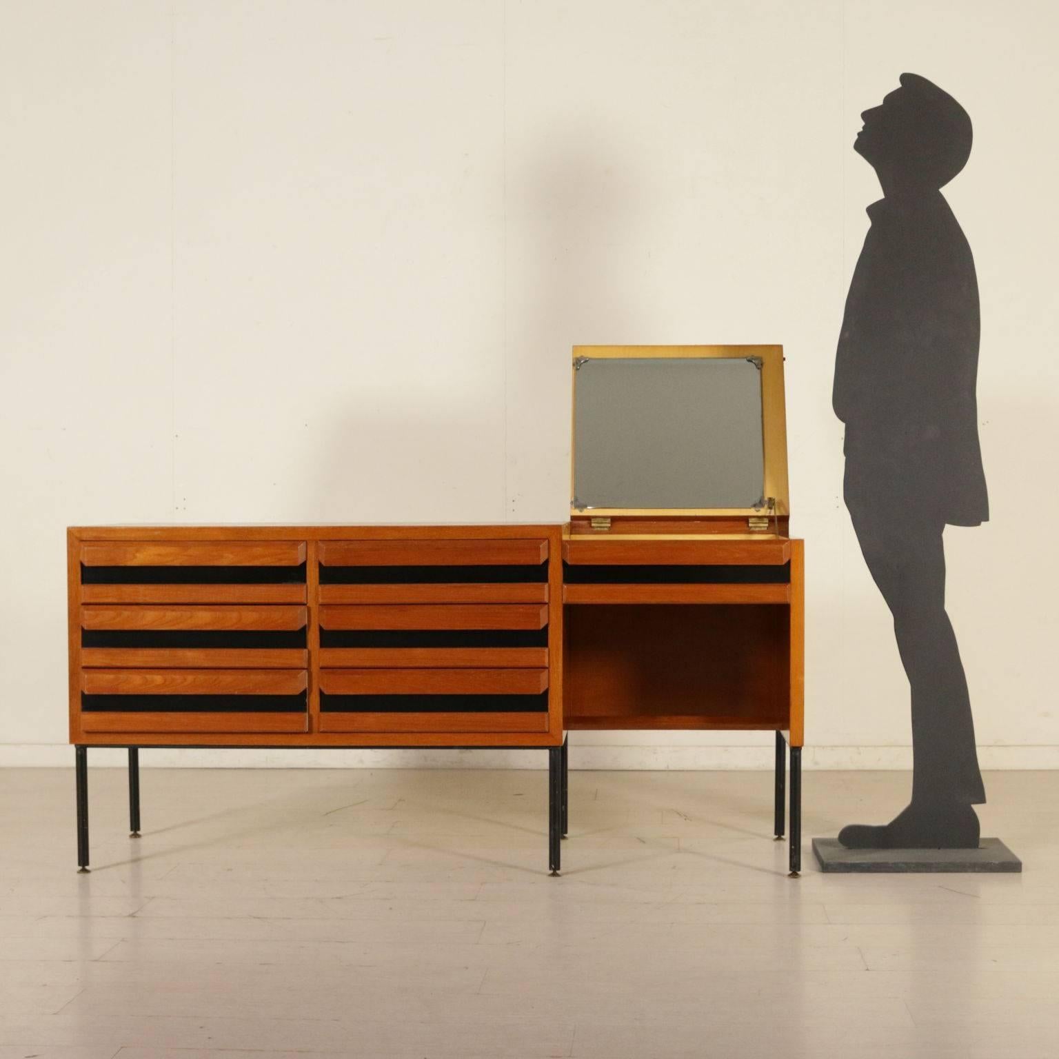 A chest of drawers with dressing corner. Teak veneer, Formica inserts, metal and brass legs. Manufactured in Italy, 1960s.