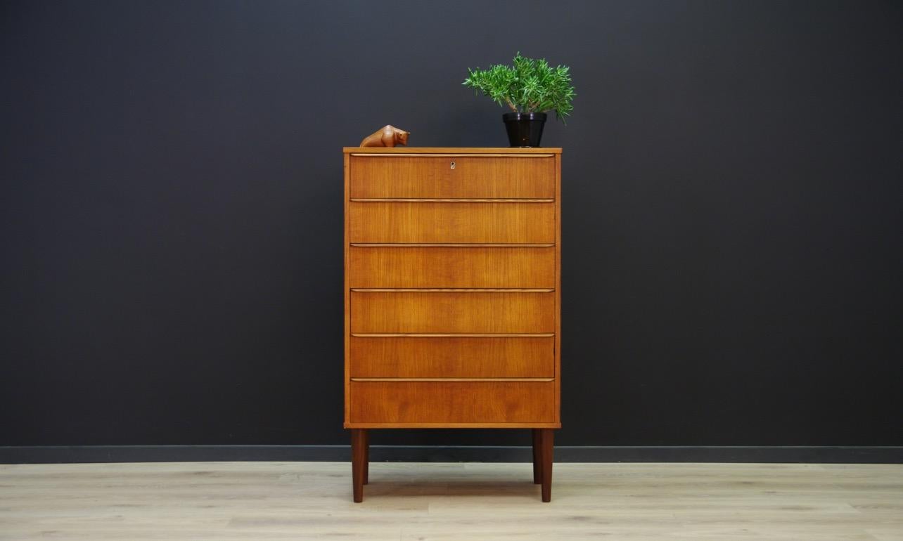 Classic chest of drawers from the 1960s-1970s, minimalist form - Scandinavian design. Surface covered with teak veneer. The furniture has six capacious drawers. Preserved in good condition (small bruises and scratches, filled veneer loss) - directly