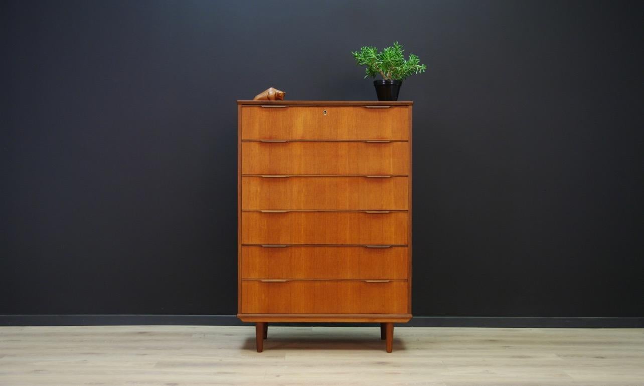 Classic chest of drawers from the 1960s-1970s, Minimalist form - Danish design. Chest is finished with teak veneer. The furniture has six capacious drawers. No key in the set. Preserved in good condition (small bruises and scratches) - directly for