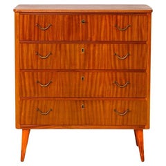 Chest of drawers with metal handles