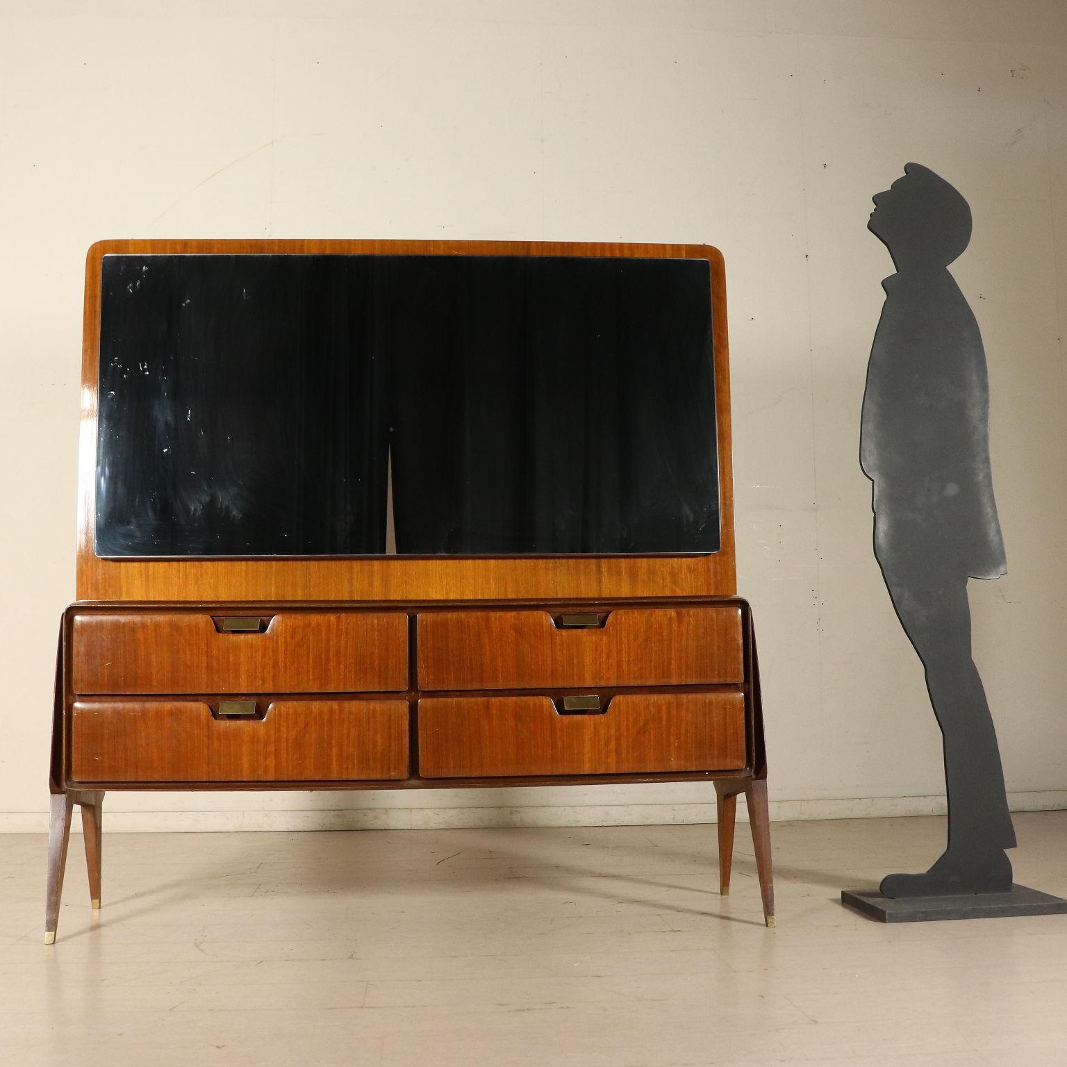 A chest of drawers with mirror designed for Consorzio Esposizione Mobili Cantù, mahogany veneer, back-treated glass, brass handles and ferrules. Manufactured in Cantu', Italy, 1950s.