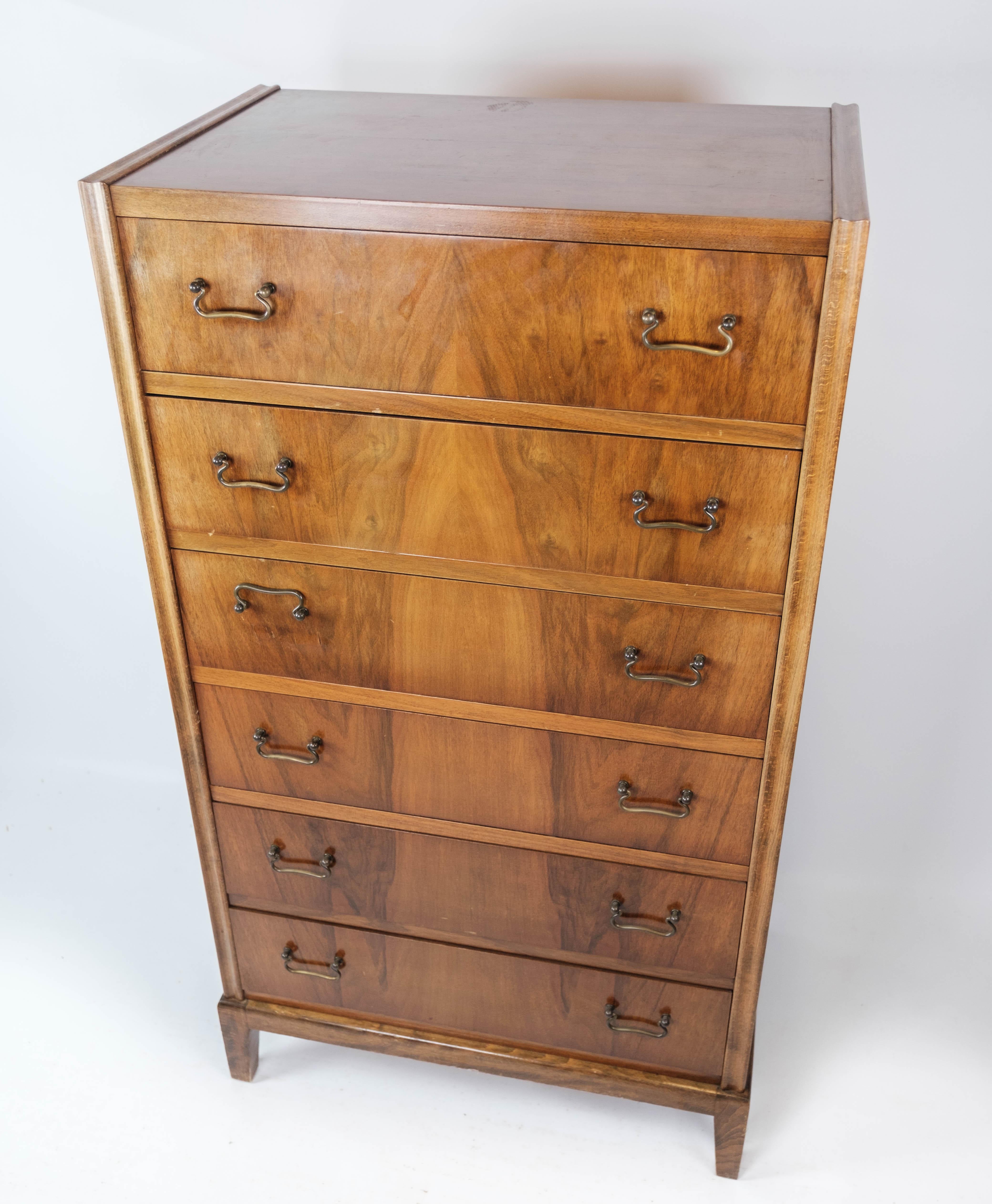 Chest of drawers with six drawers of walnut, designed by Frits Henningsen from the 1940s. The chest is in great vintage condition.