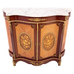 Chest of drawers with stone top, Western Europe, first half of the 20th century.