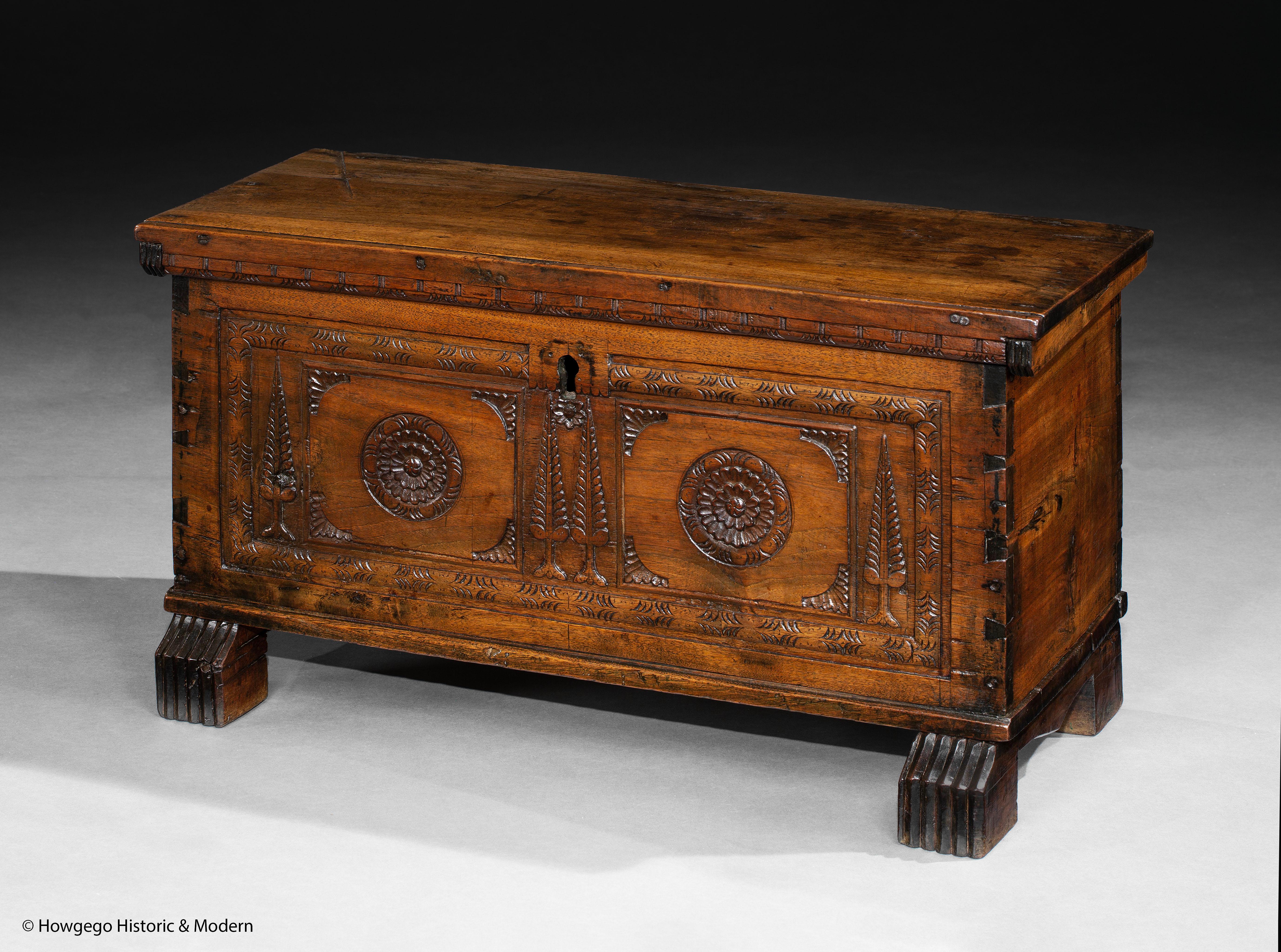 Museum Quality, Small, Spanish, Walnut Chest With Rare Cypress Tree Carving, A Single Plank Top & Outstanding Colour & Patina

- Rare carved decoration of cypress trees alongside more traditional Spanish ornamentation
- Rare small size
- Exceptional