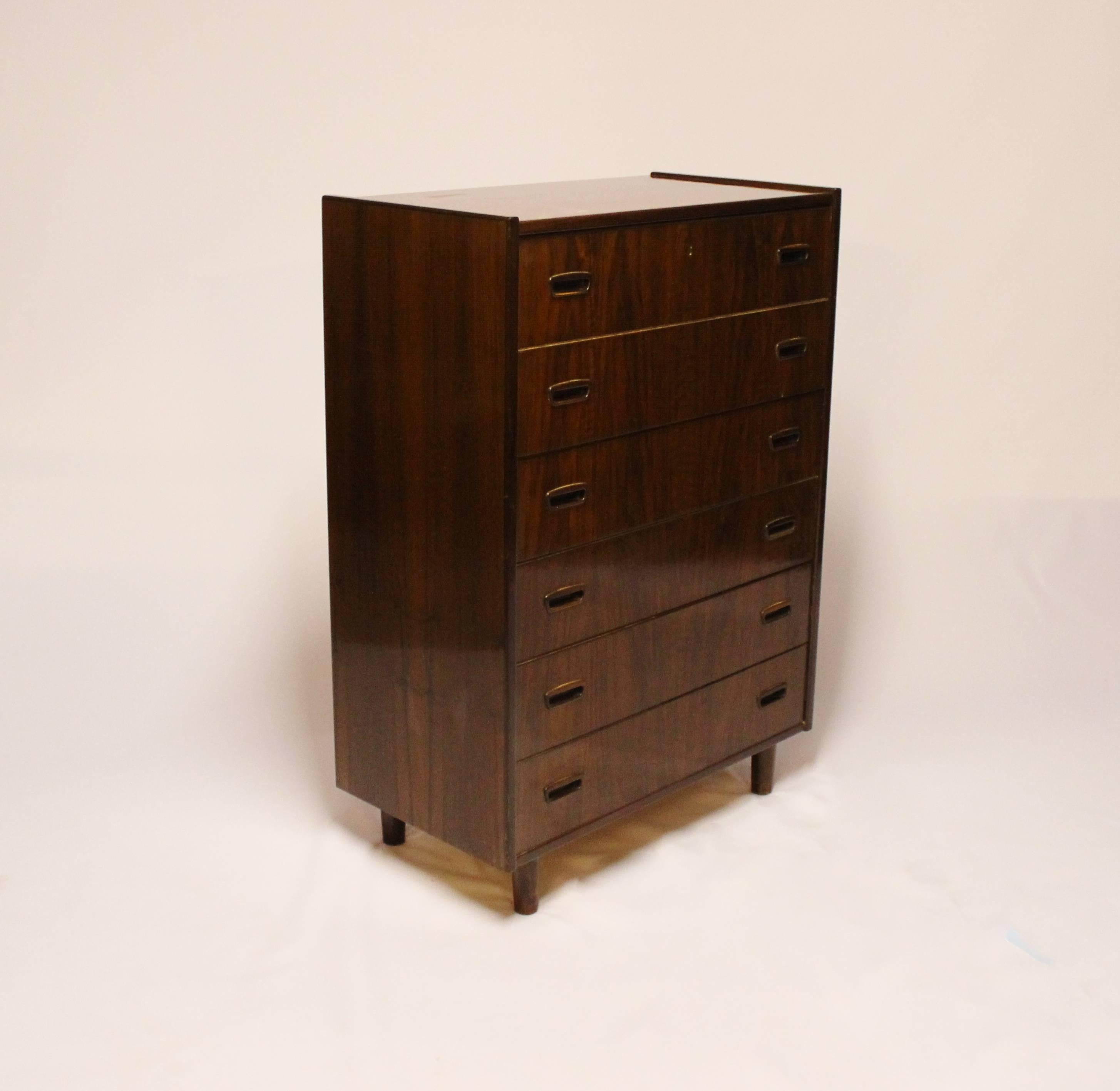 Chest with six drawers in walnut of Danish design from the 1960s. The chest is in great vintage condition.