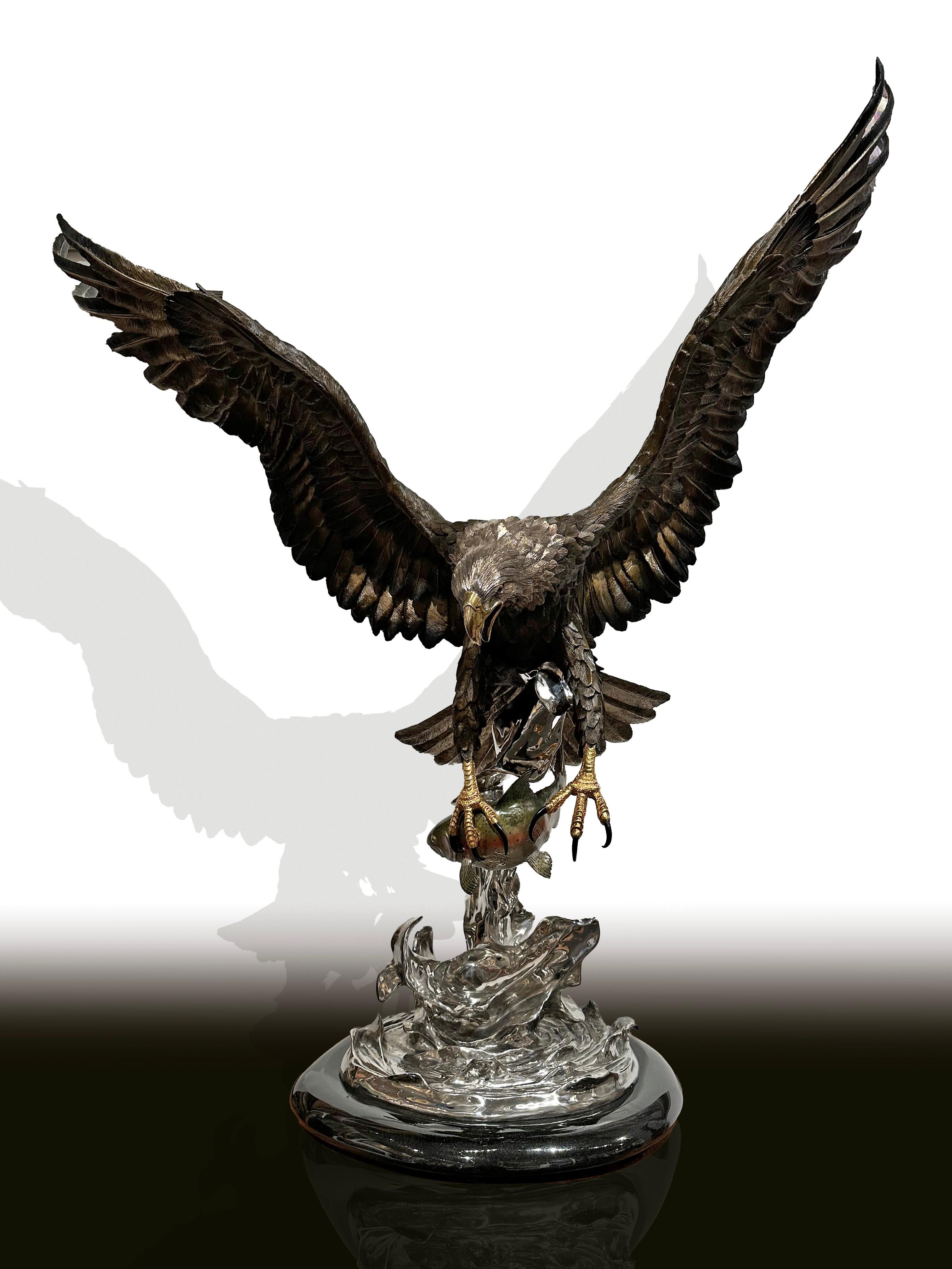 "On the Wings of an Eagle by Chester Fields is one of his most popular sculptures. This is number 26 of 75 made. It is made with the following:
Bronze Casting
Deluxe Patina
Gold Beak, Feet and Eyes
Black Sapphire Eyes
316L Stainless Steel