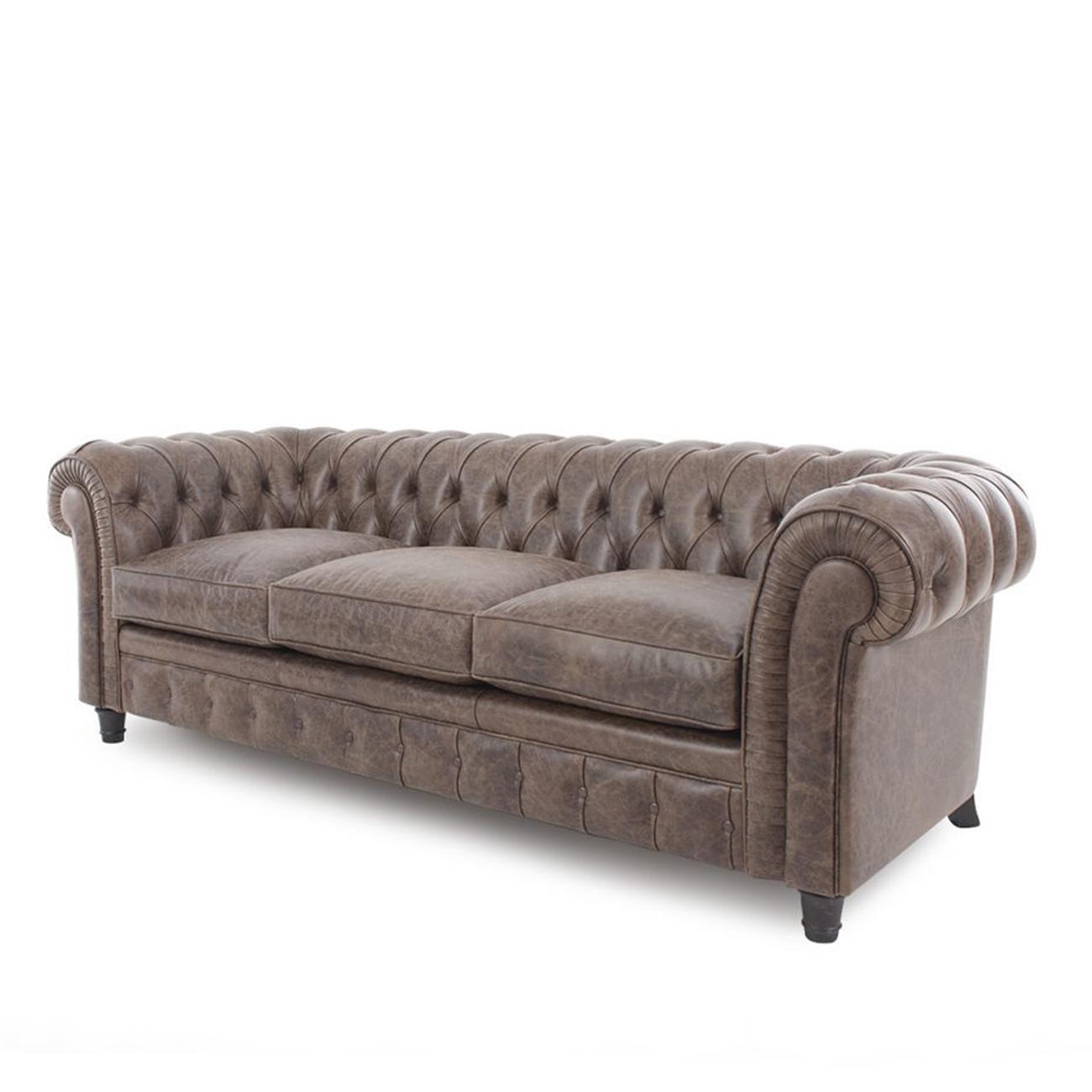 Sofa Chester Patinated 3 with all structure in solid beech wood,
upholstered and covered with hand patinated high quality leather,
in taupe finish. With capitonated backrest and armrests.
With circular feet in matt dark Brown finish.
Also