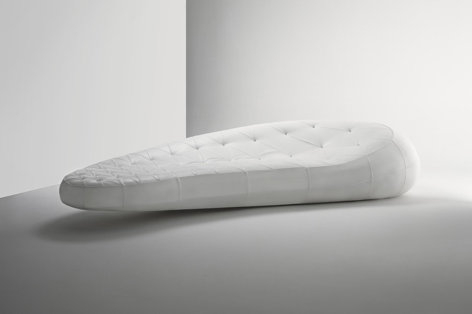 Celebrated architect Amanda Levete took inspiration from the traditional Chesterfield sofa for this futuristic design. Sophisticated architectural drawing technology created the soft, modern contours and organic form of the Chester Limited Edition.