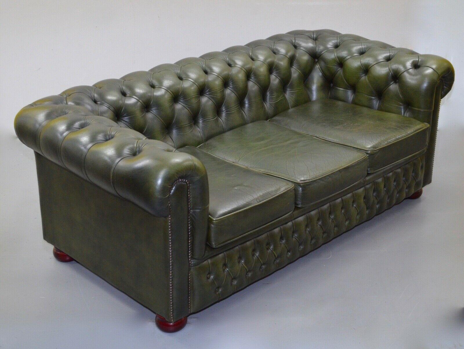 We are delighted to offer for sale this luxury classic olive green leather Chesterfield 3-seater sofa. It has been hand made with deep buttoned arms and back with this rich green premium leather that has a beautiful patina.
As is standard with
