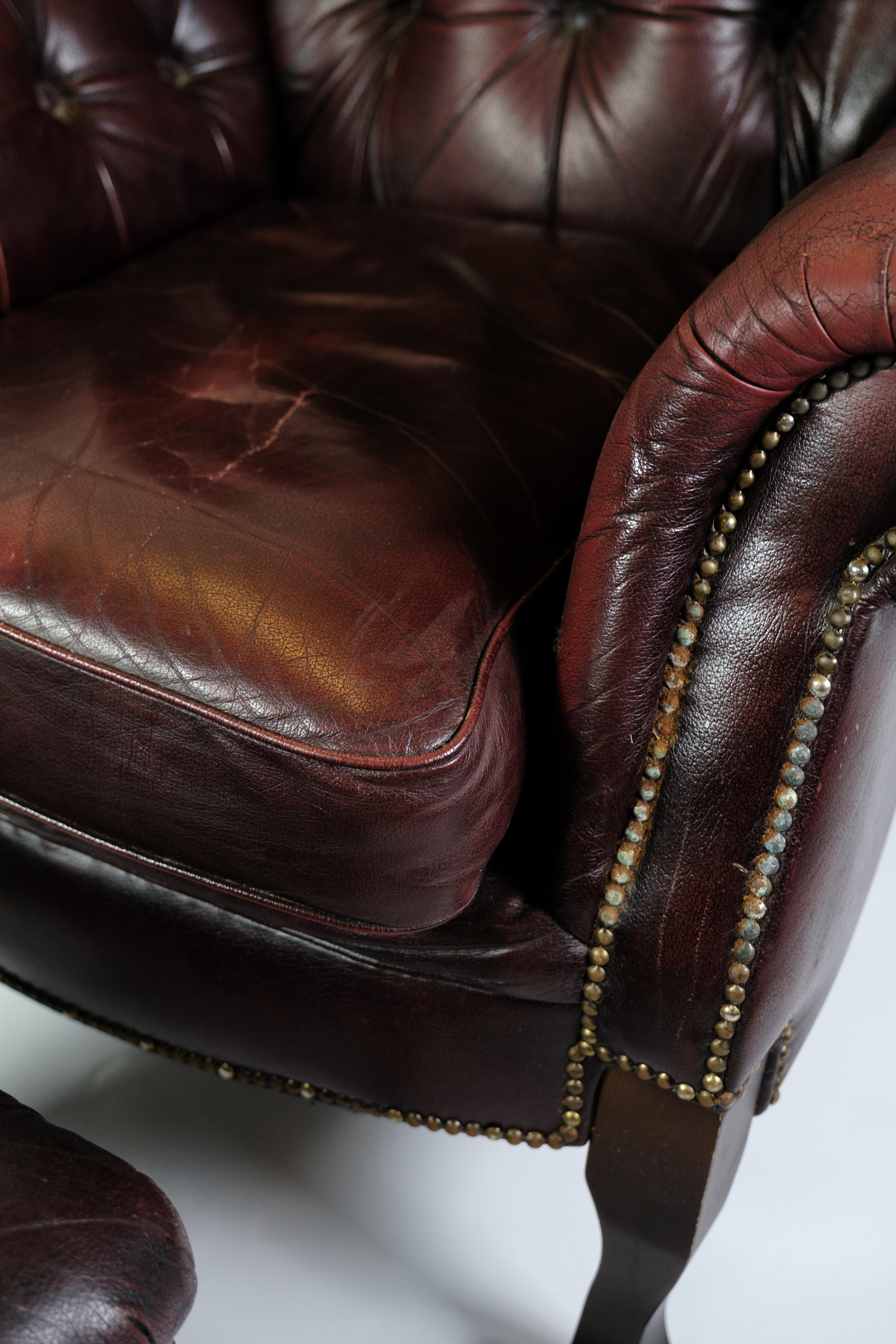 Early 20th Century Chesterfield Armchair With Footstool Made In Red Leather From 1920s For Sale