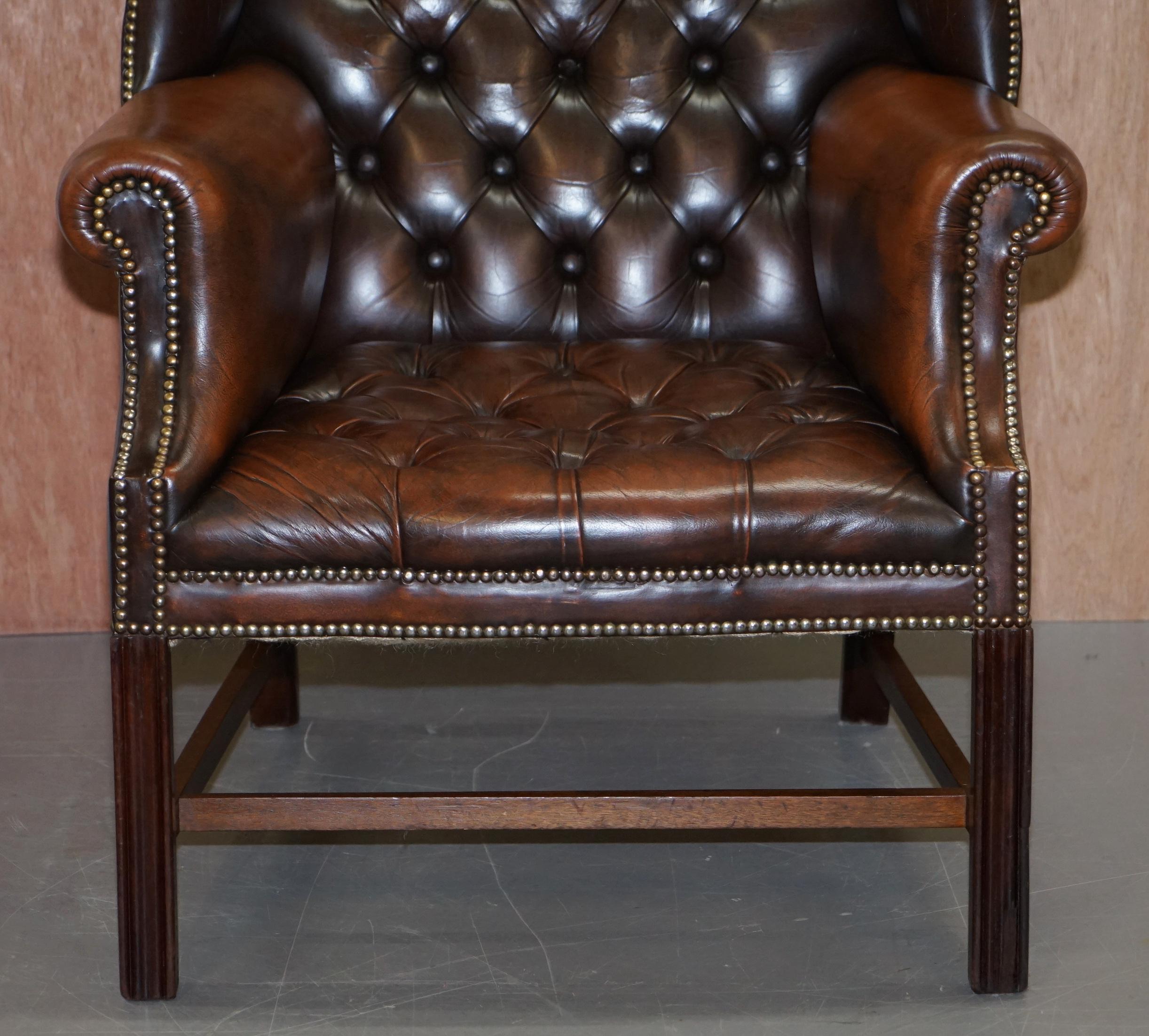 Mid-20th Century Chesterfield Brown Leather Wingback Georgian H-Framed Armchair and Footstool