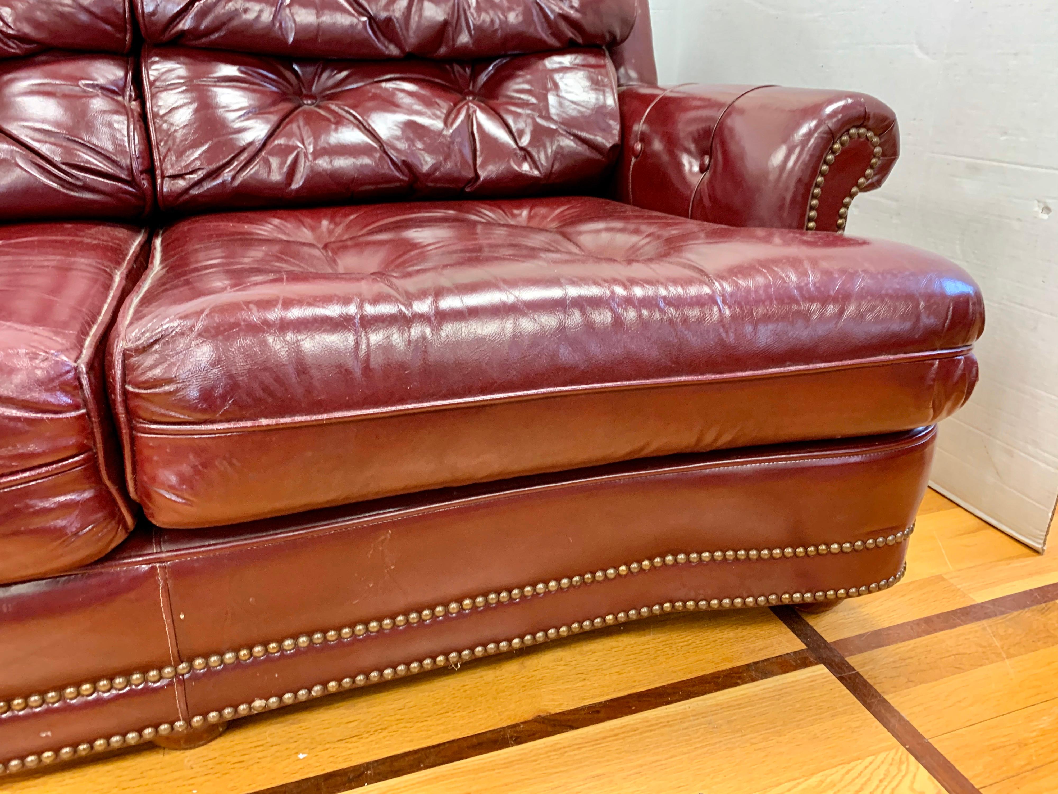 American Chesterfield Burgundy Leather Sofa with Brass Nailheads