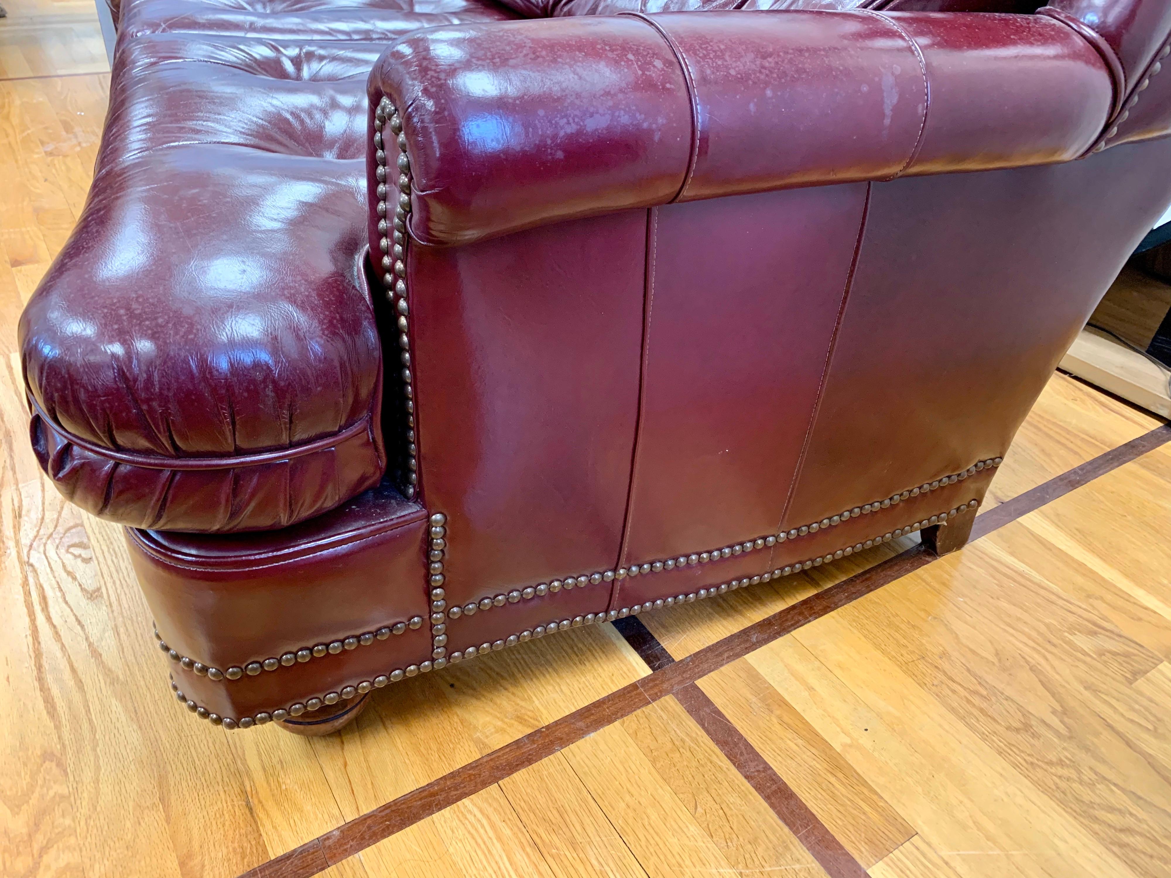 Late 20th Century Chesterfield Burgundy Leather Sofa with Brass Nailheads