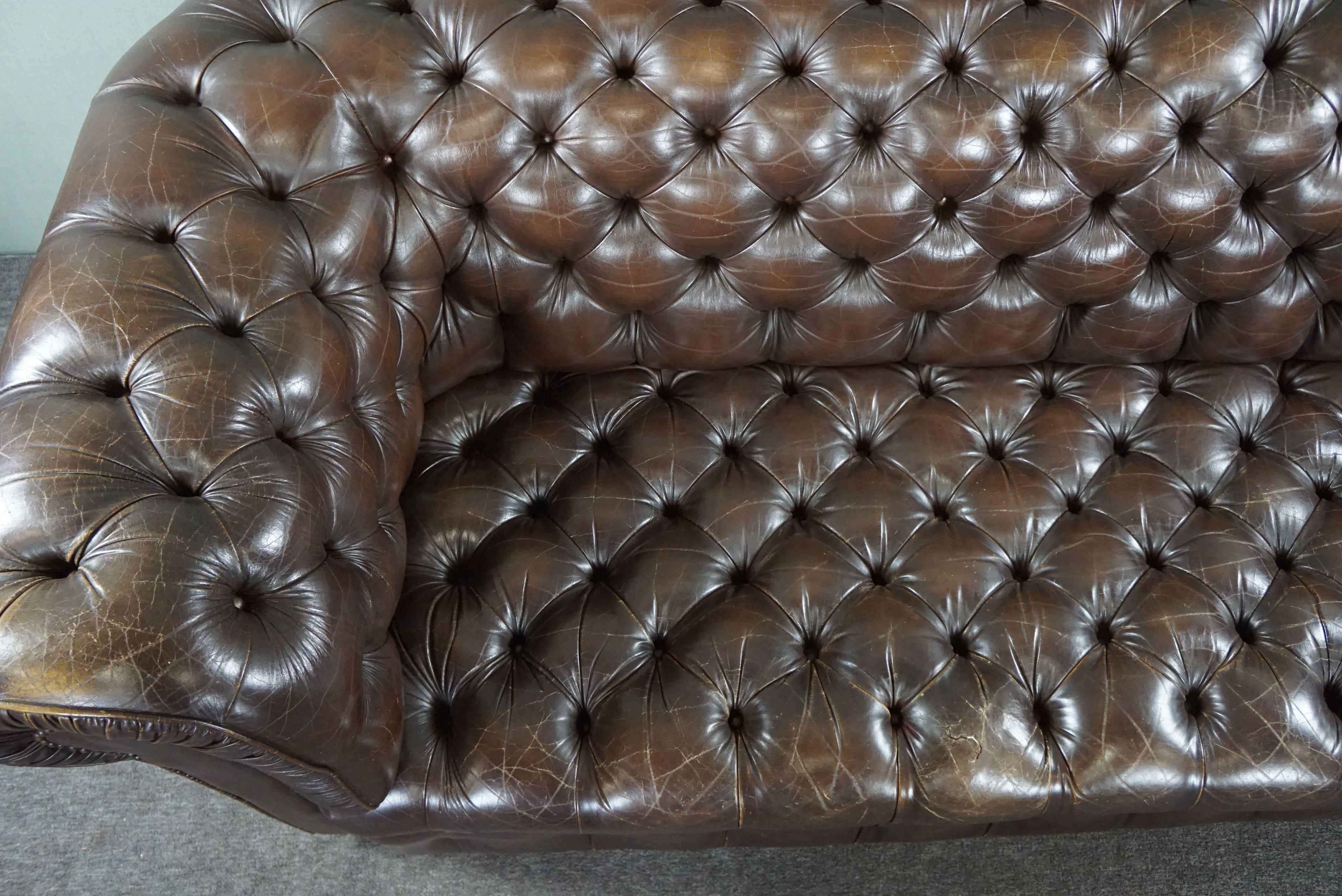 Chesterfield button seat sofa full of allure, 3 seater For Sale 1