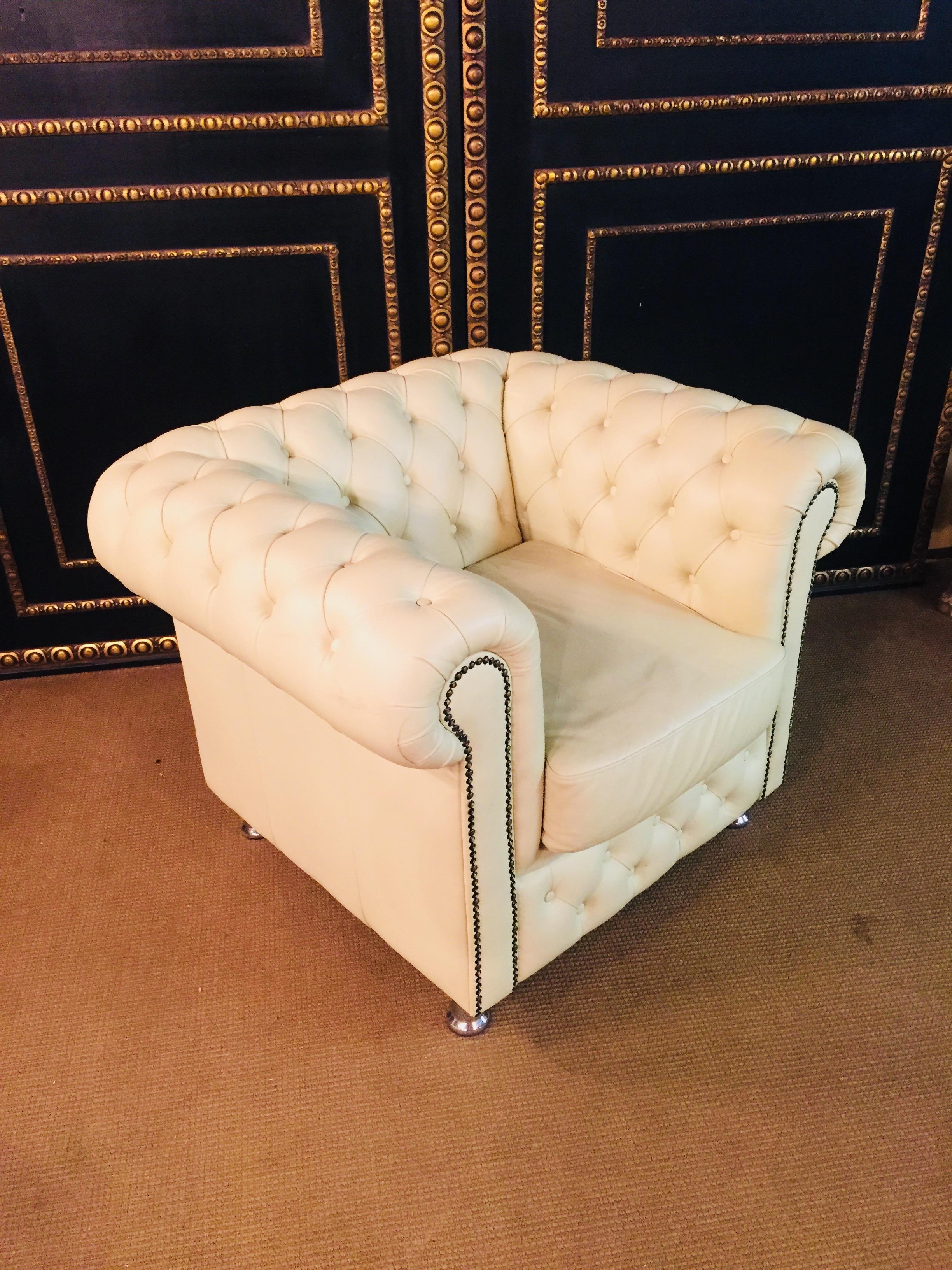 Chesterfield armchair. Armchair measures: height x 80 cm, width x 110 cm, x depth 100cm. Condition: The chair is in a very good condition. Very comfortable and with beautiful rare color beige not white. Upholstery is in a very good condition (see
