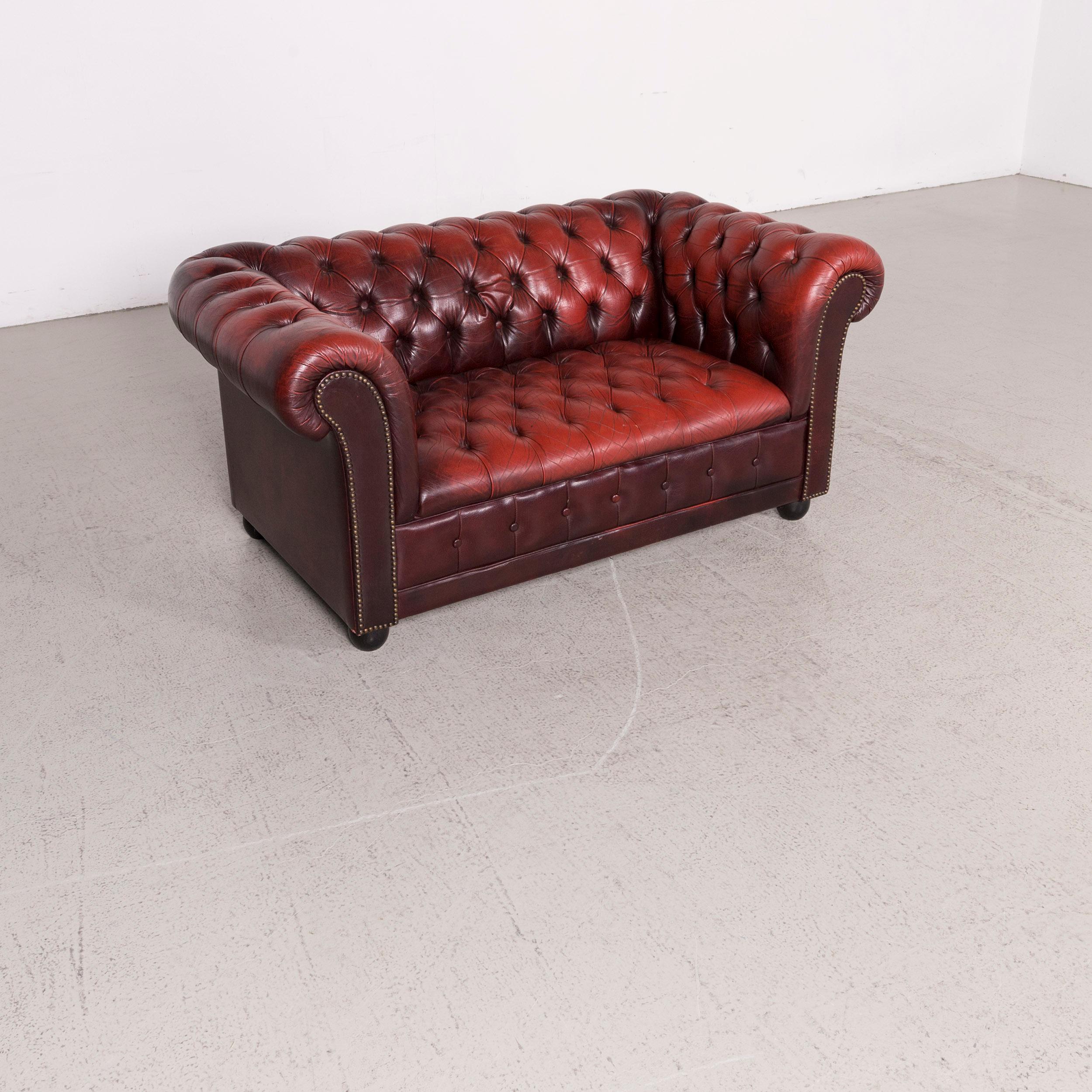 We bring to you a Chesterfield designer leather sofa red two-seat genuine leather vintage retro.

Product measurements in centimeters:

Depth 85
Width 150
Height 70
Seat-height 40
Rest-height 70
Seat-depth 45
Seat-width 90
Back-height