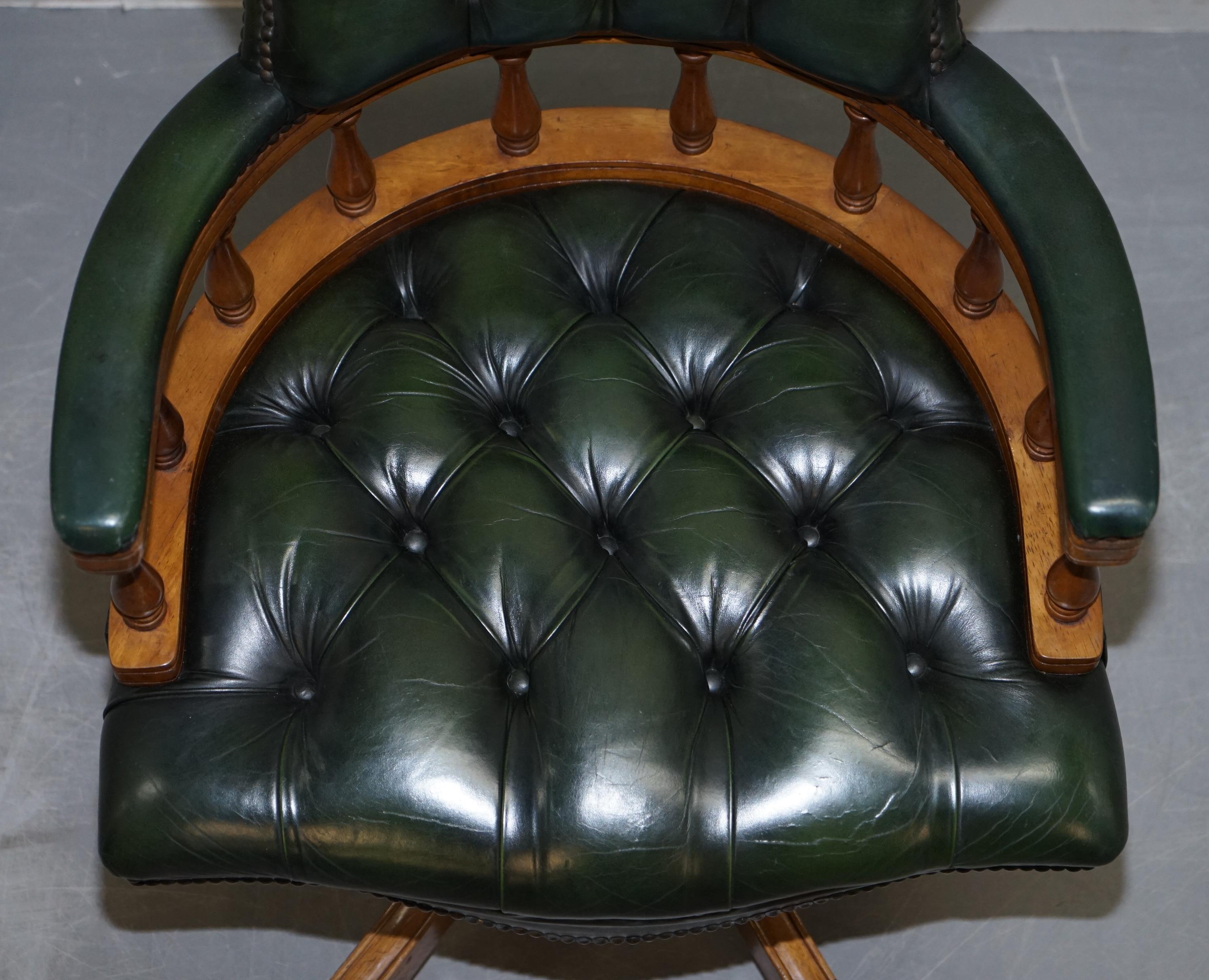 green leather chesterfield swivel chair