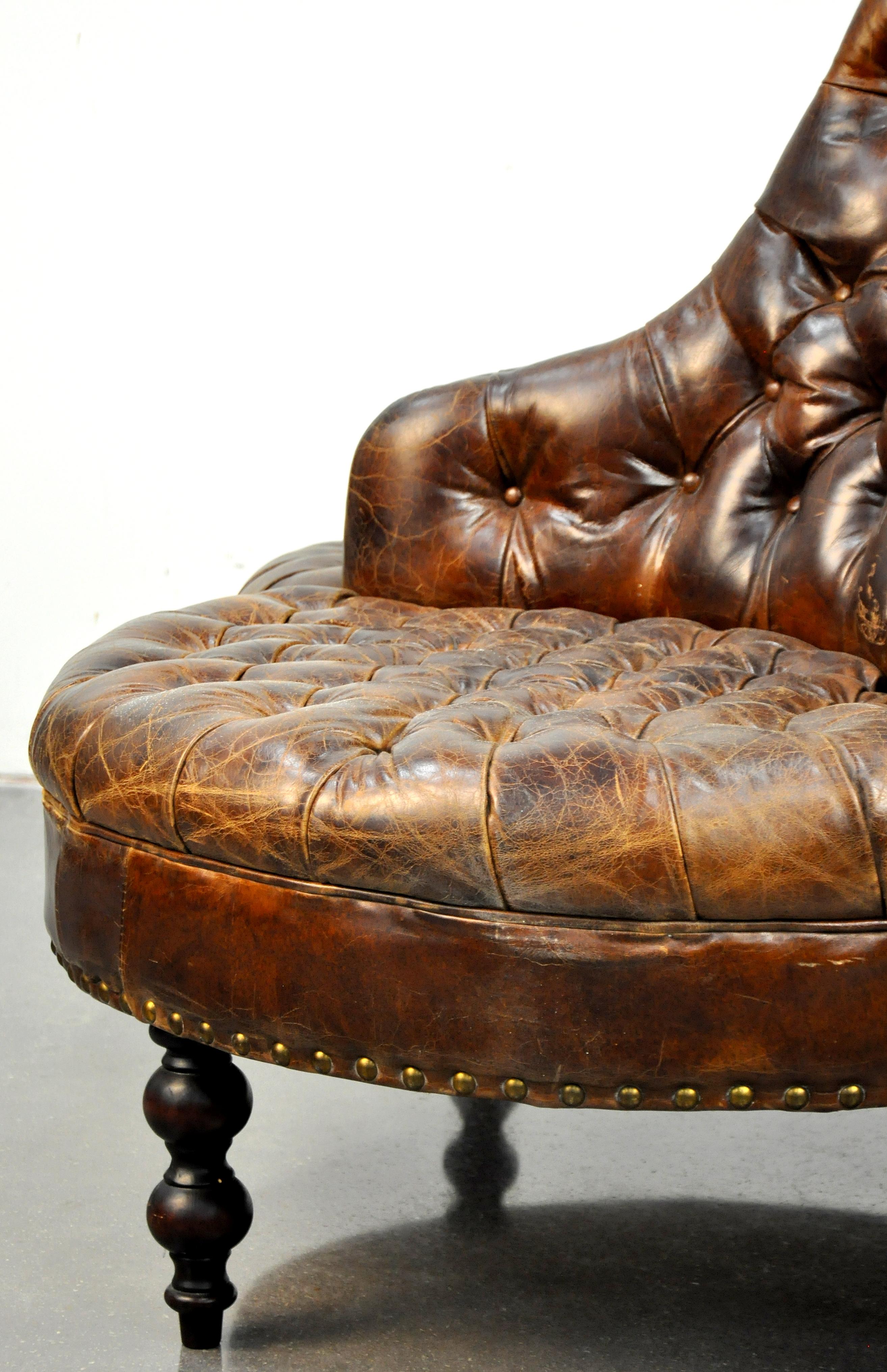 Chesterfield Distressed Leather and Brass Round Sofa In Good Condition In Miami, FL