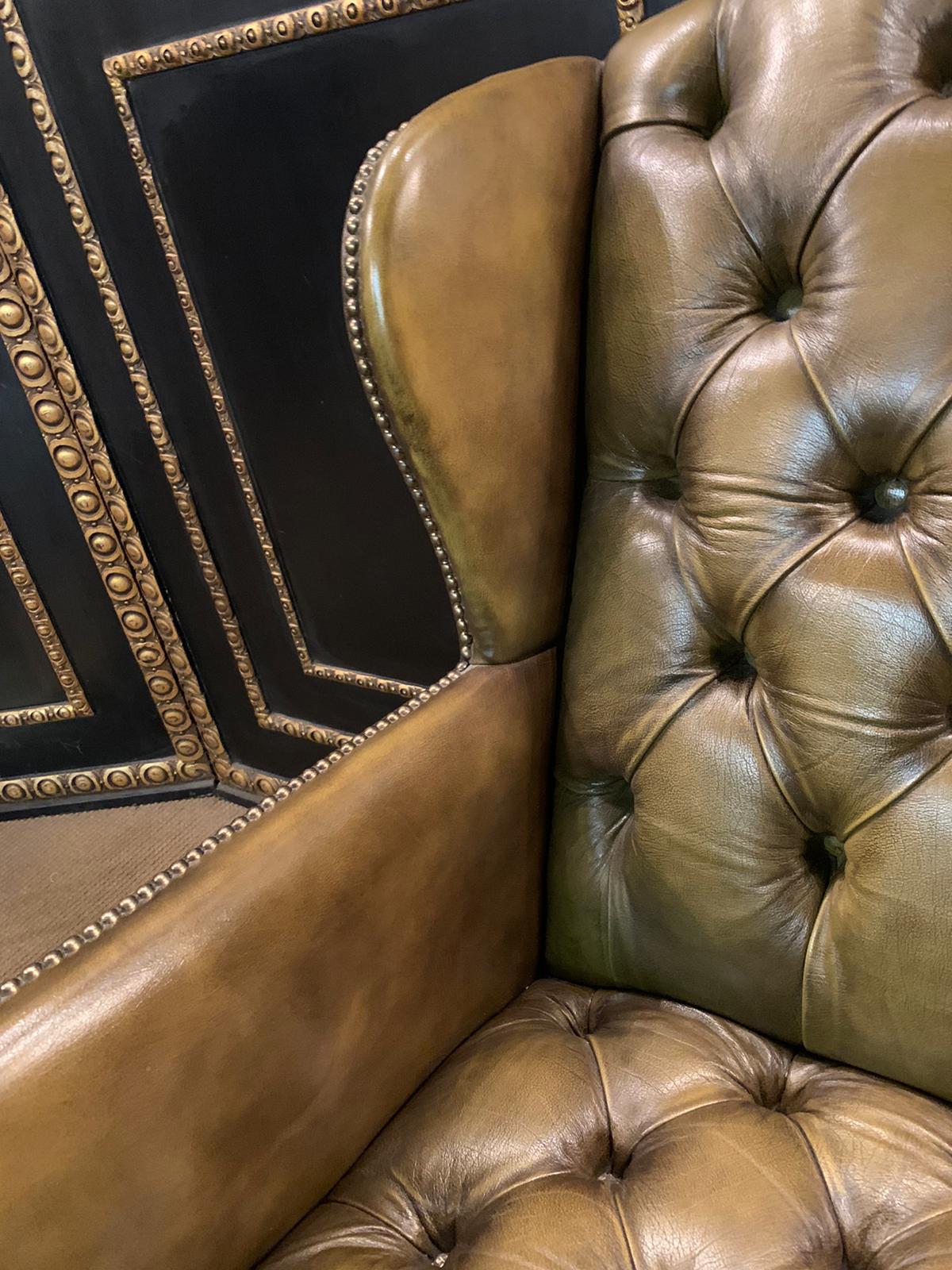 green leather chesterfield footstool
