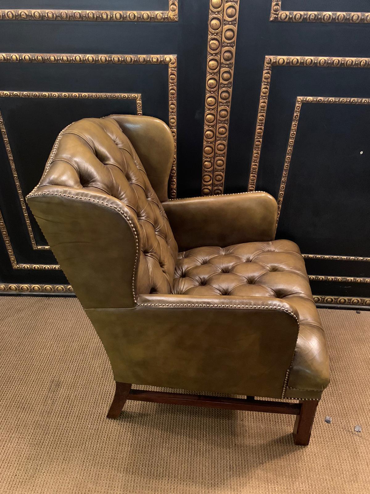 Chesterfield Green Leather Wingback Georgian H-Framed Armchair and Footstool In Good Condition In Berlin, DE