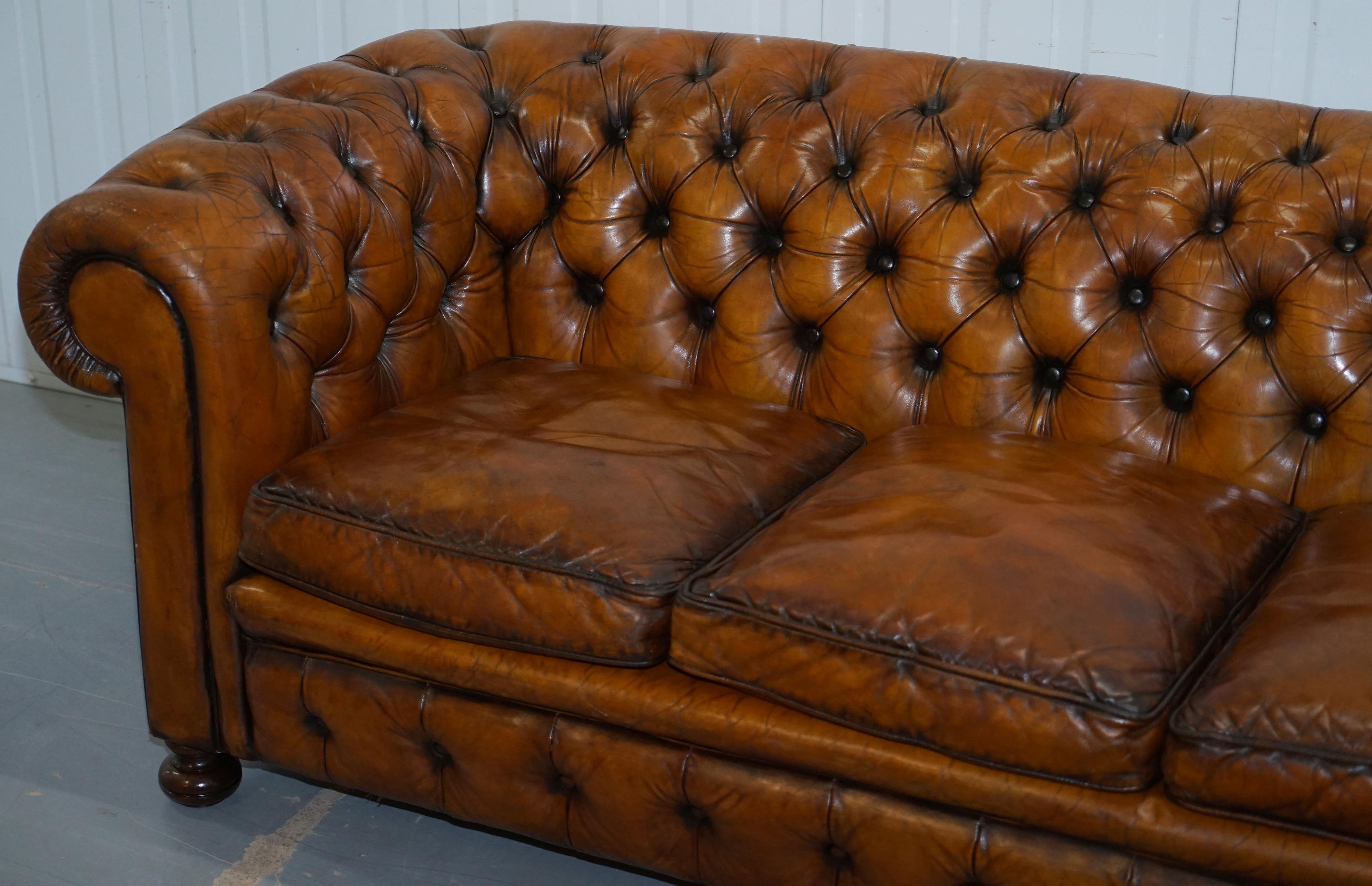 brown sofa with cushions