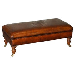 Vintage Chesterfield Hand Dyed Leather Footstool on Brass Castors